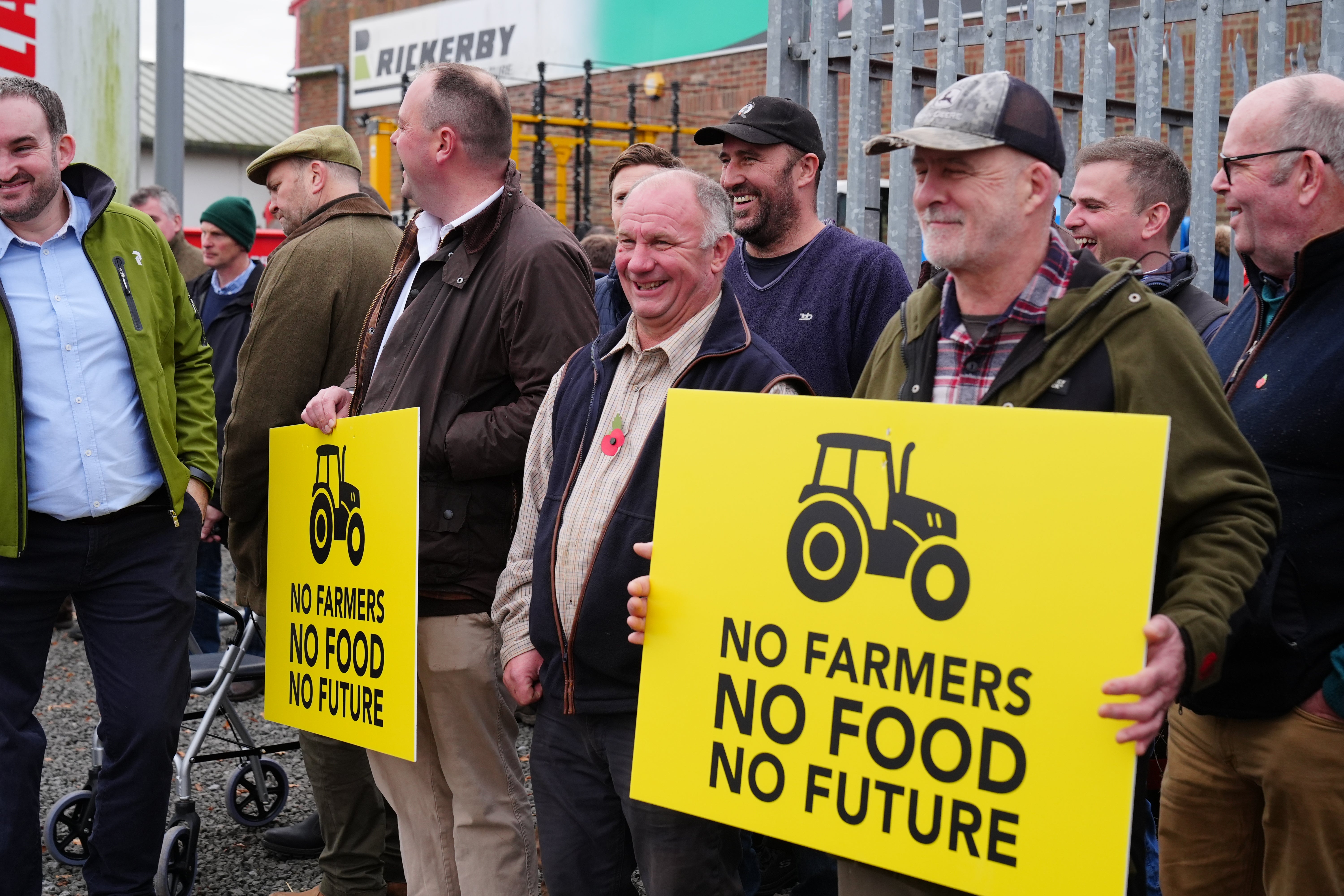 Farmers protest outside the Northern Farming Conference in Hexham against the government's proposals to reform inheritance tax rules