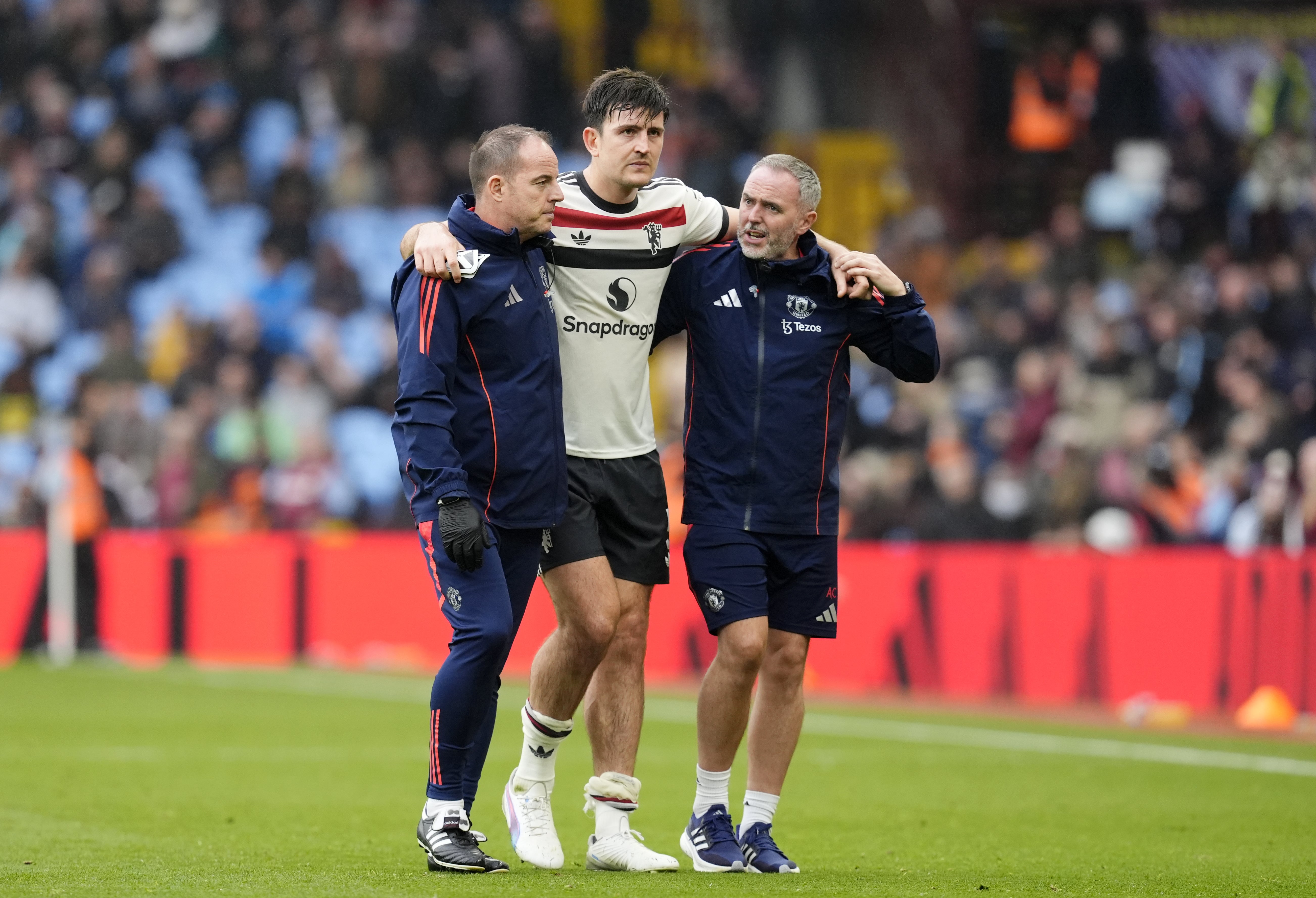 Harry Maguire (centre) is working his way back to fitness