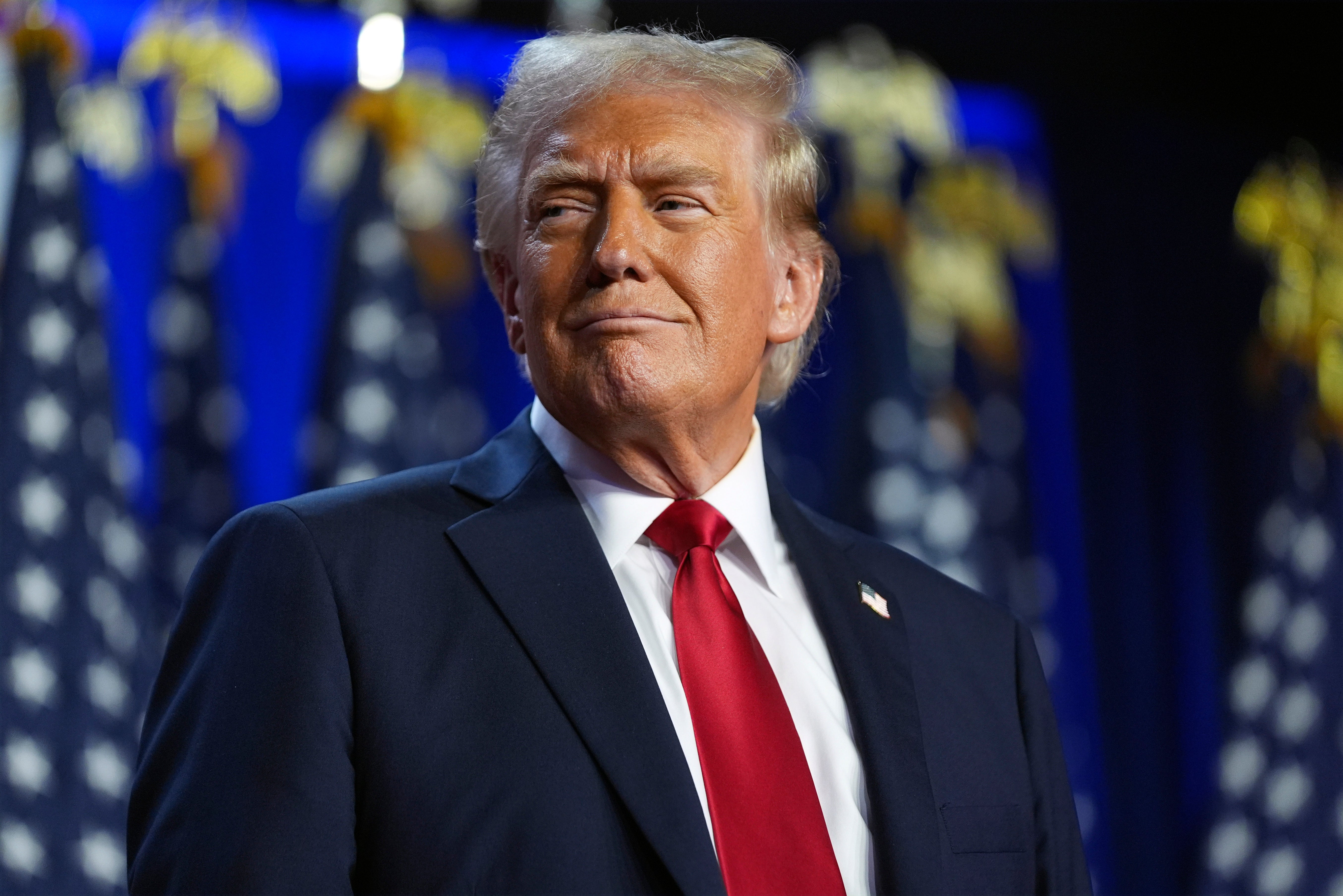 Donald Trump arrives at an election night watch party at the Palm Beach Convention Center in Florida on Wednesday. Trump, who is backed by the fossil fuel industry, has called climate change a ‘hoax’