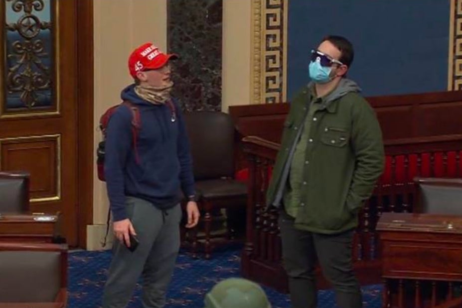 Christopher Carnell (left) was charged with obstruction of an official proceeding for his role in the January 6 attack on the Capitol