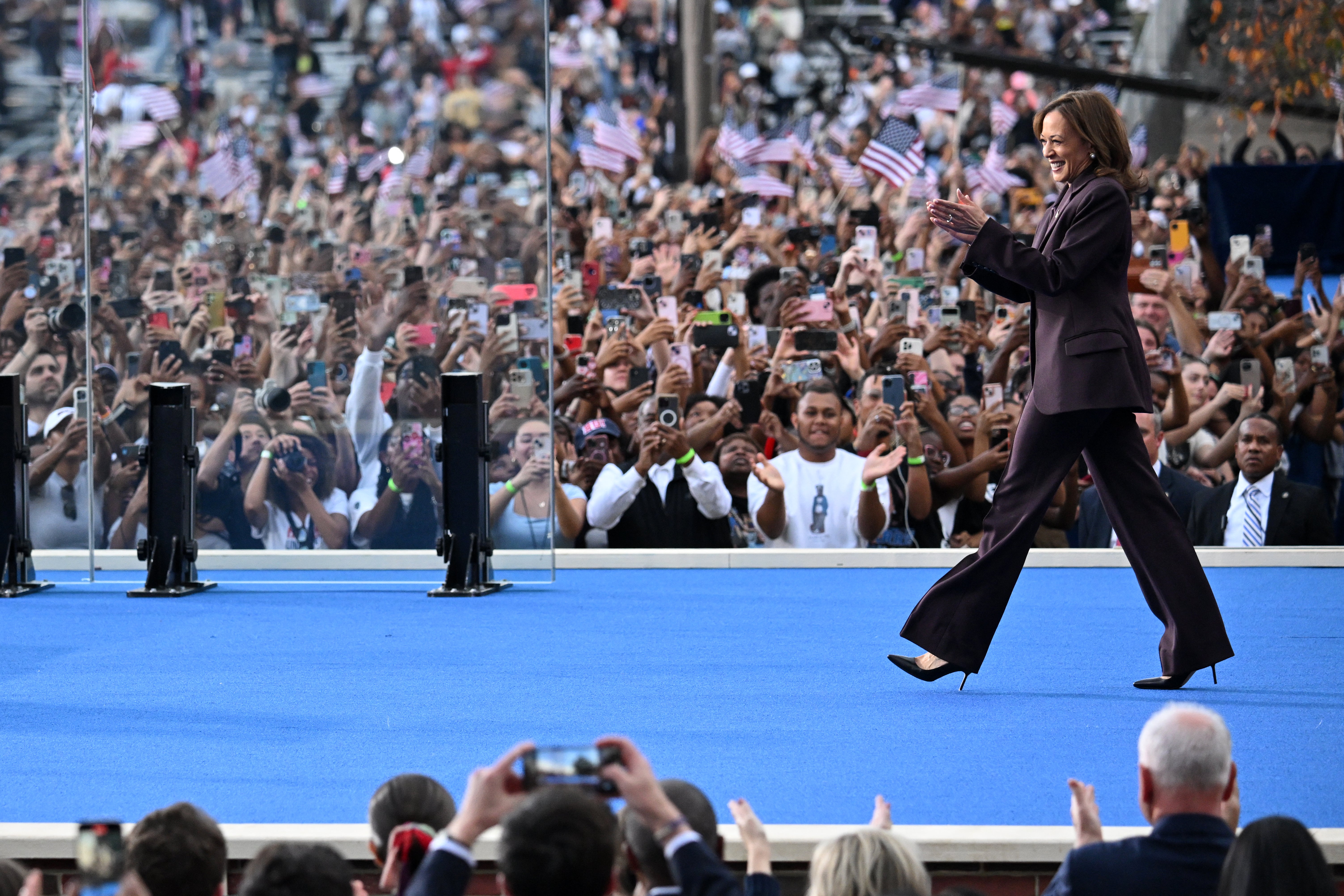 Kamala Harris walks on stage as she arrive to speak at Howard University in Washington, DC on November 6, hours after Donald Trump secured his victory in the 2024 presidential race.