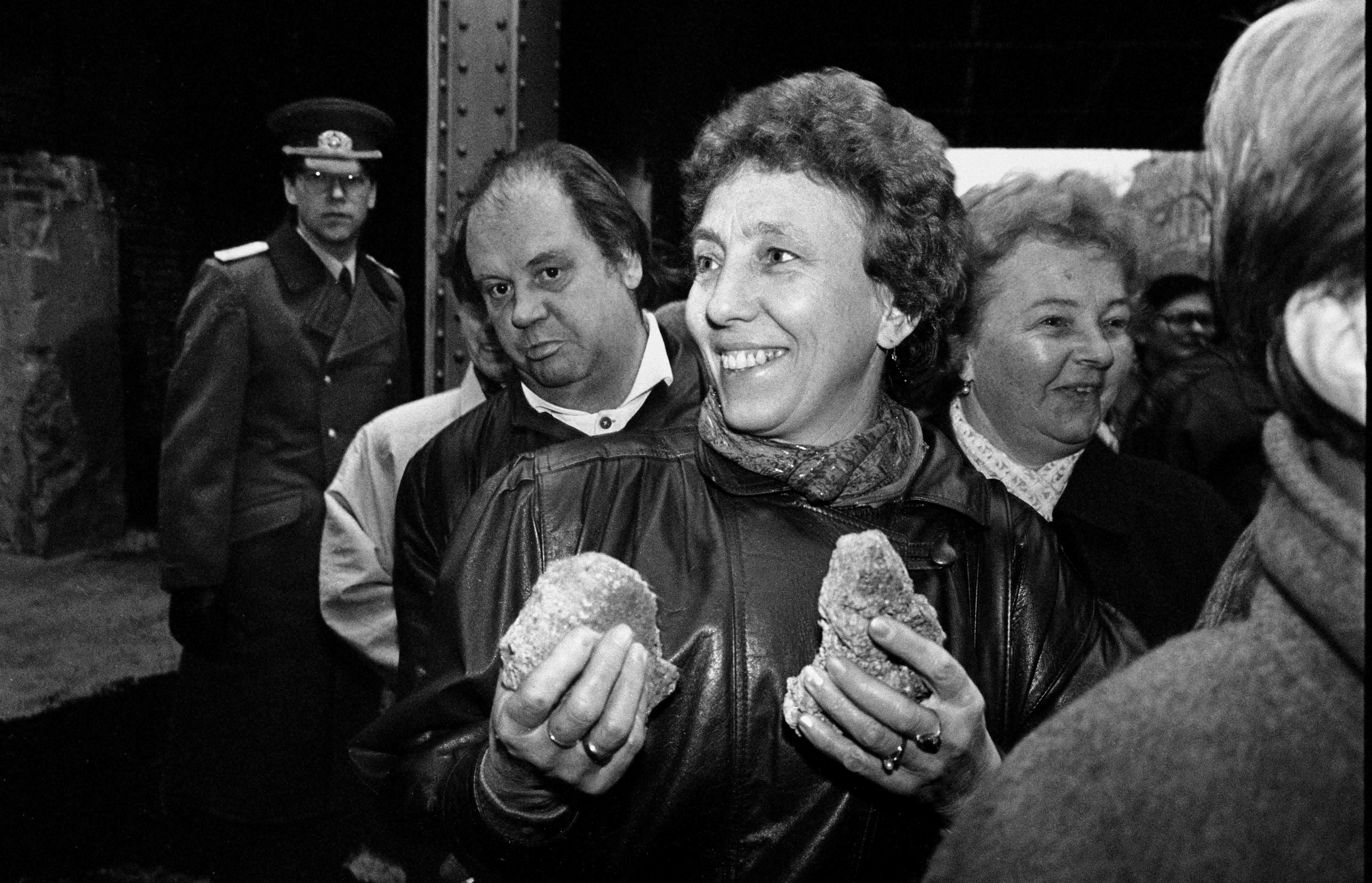 East Berliners clutching pieces of the wall three days after the fall, 12 November 1989