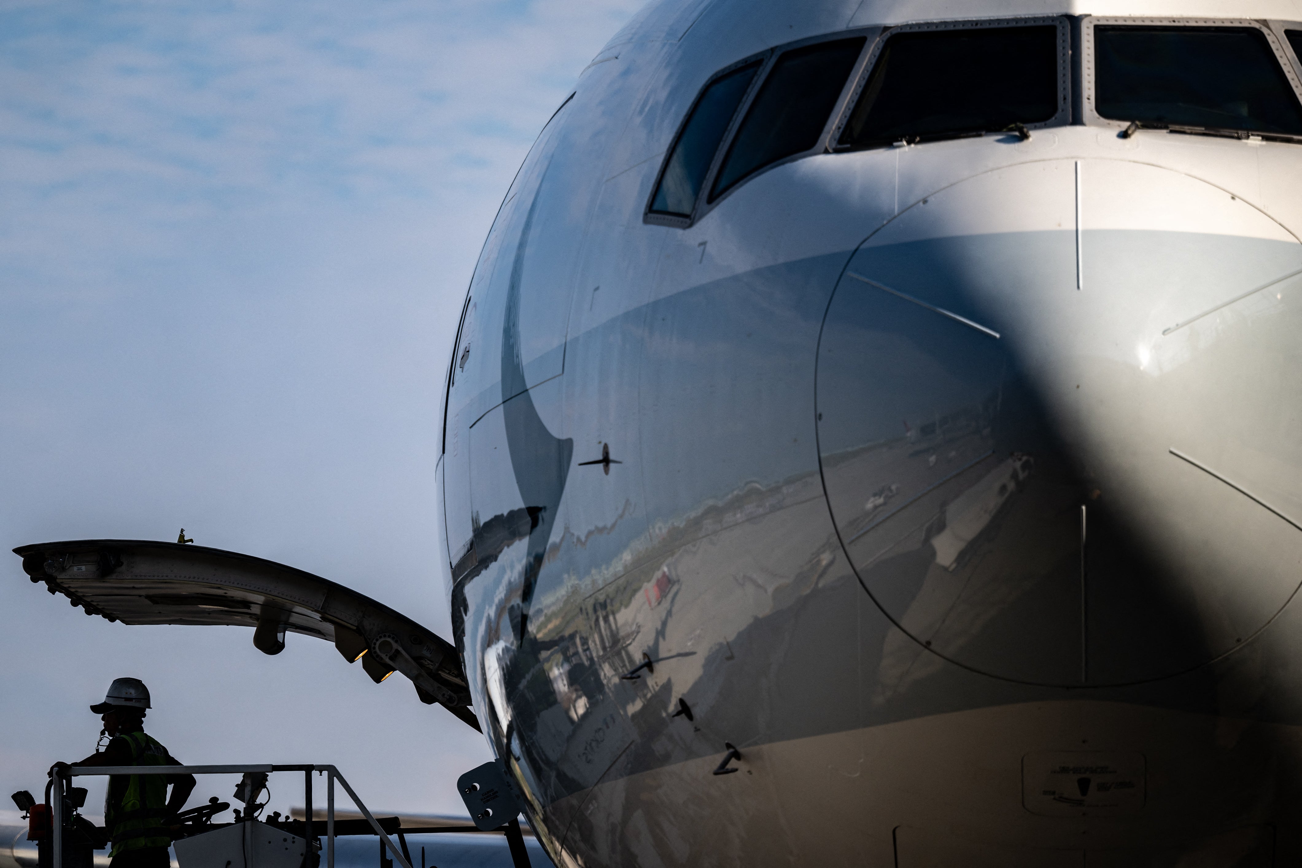 <p>This picture taken on September 3, 2024 shows a Cathay Pacific flight preparing for departure in Kansai International Airport of Osaka Prefecture</p>