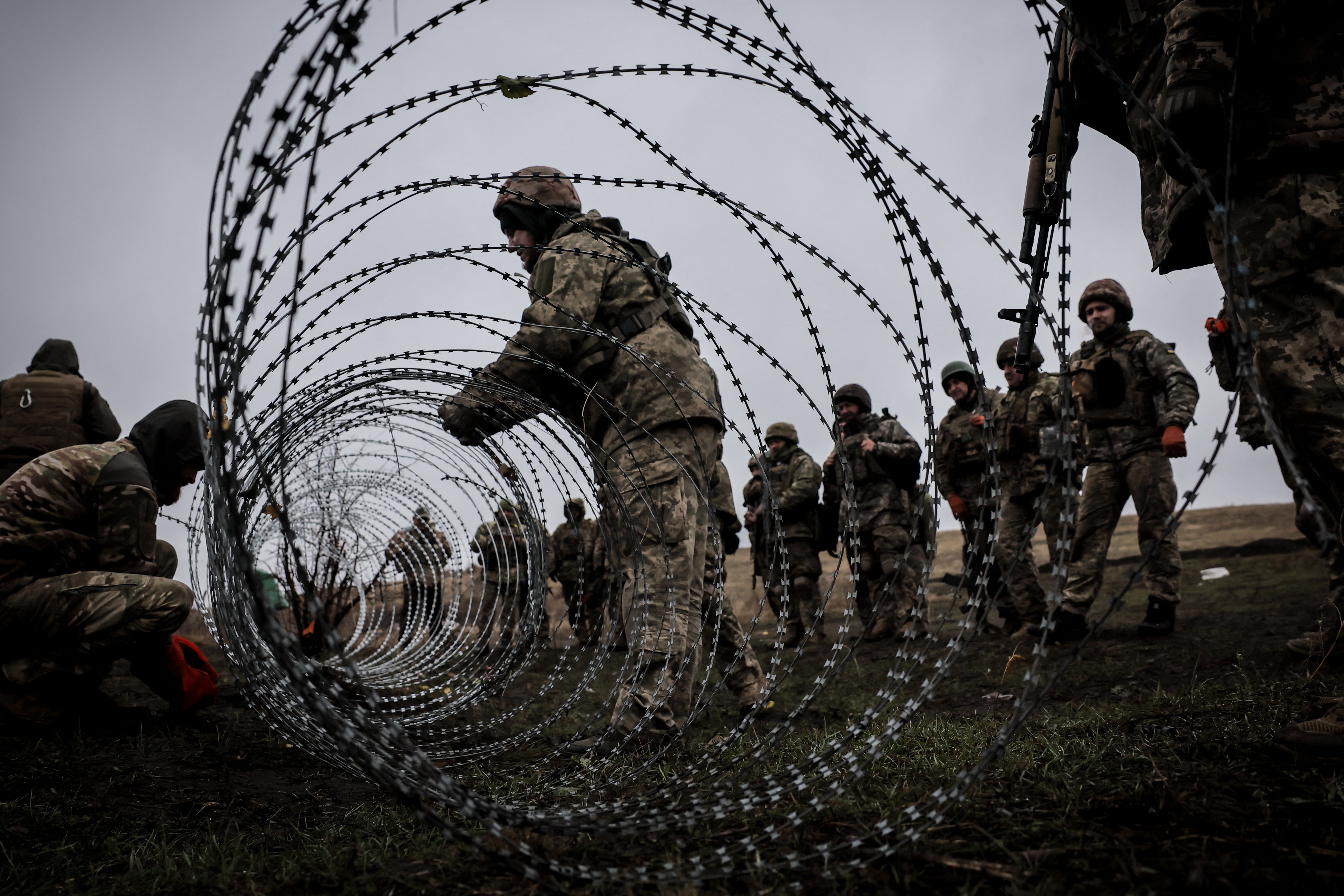 Ukrainian servicemen of the 24th Mechanized Brigade improve their tactical skills at a training field at an undisclosed location in Donetsk region, eastern Ukraine