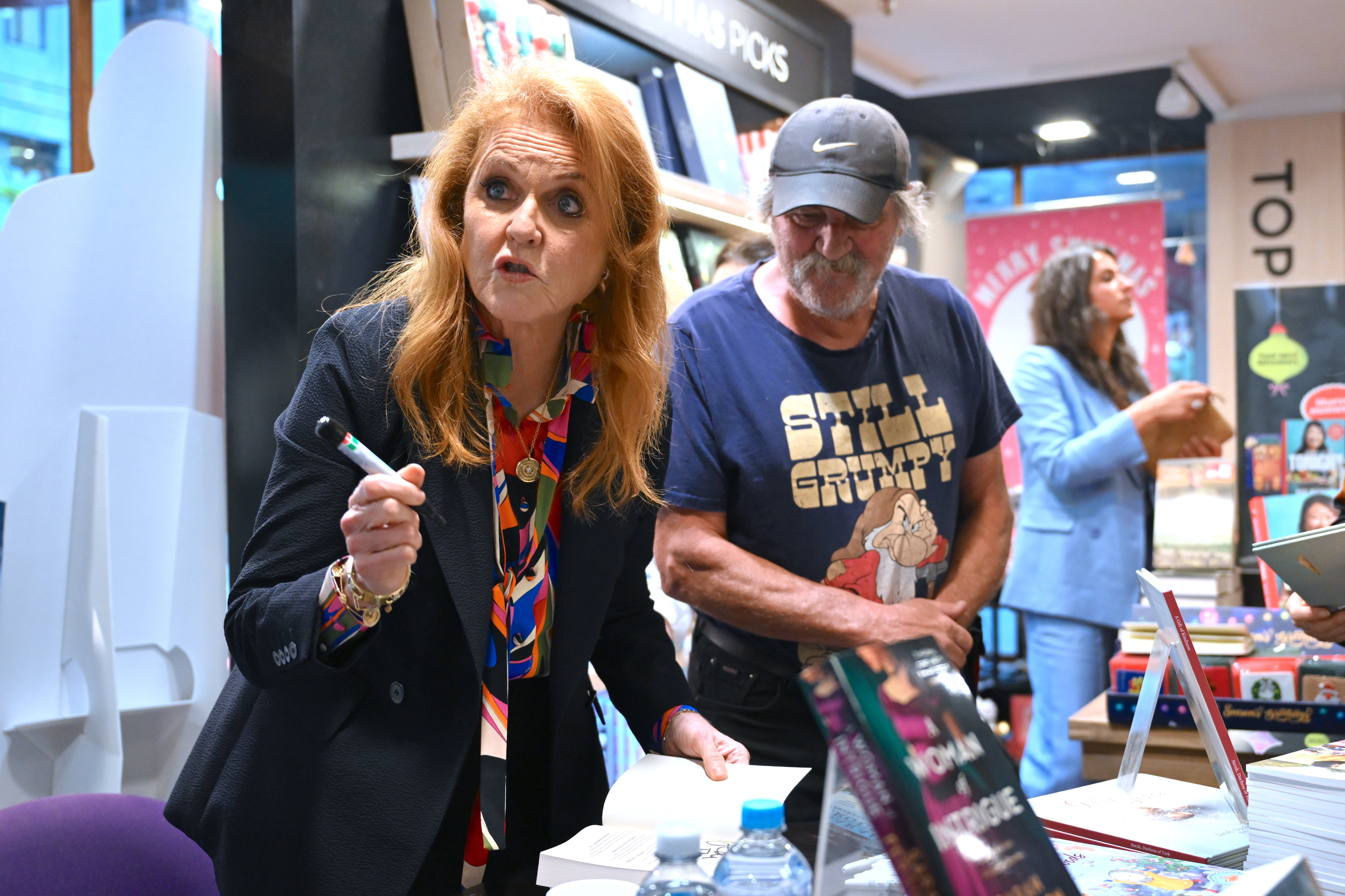 Sarah Ferguson signs books for supporters