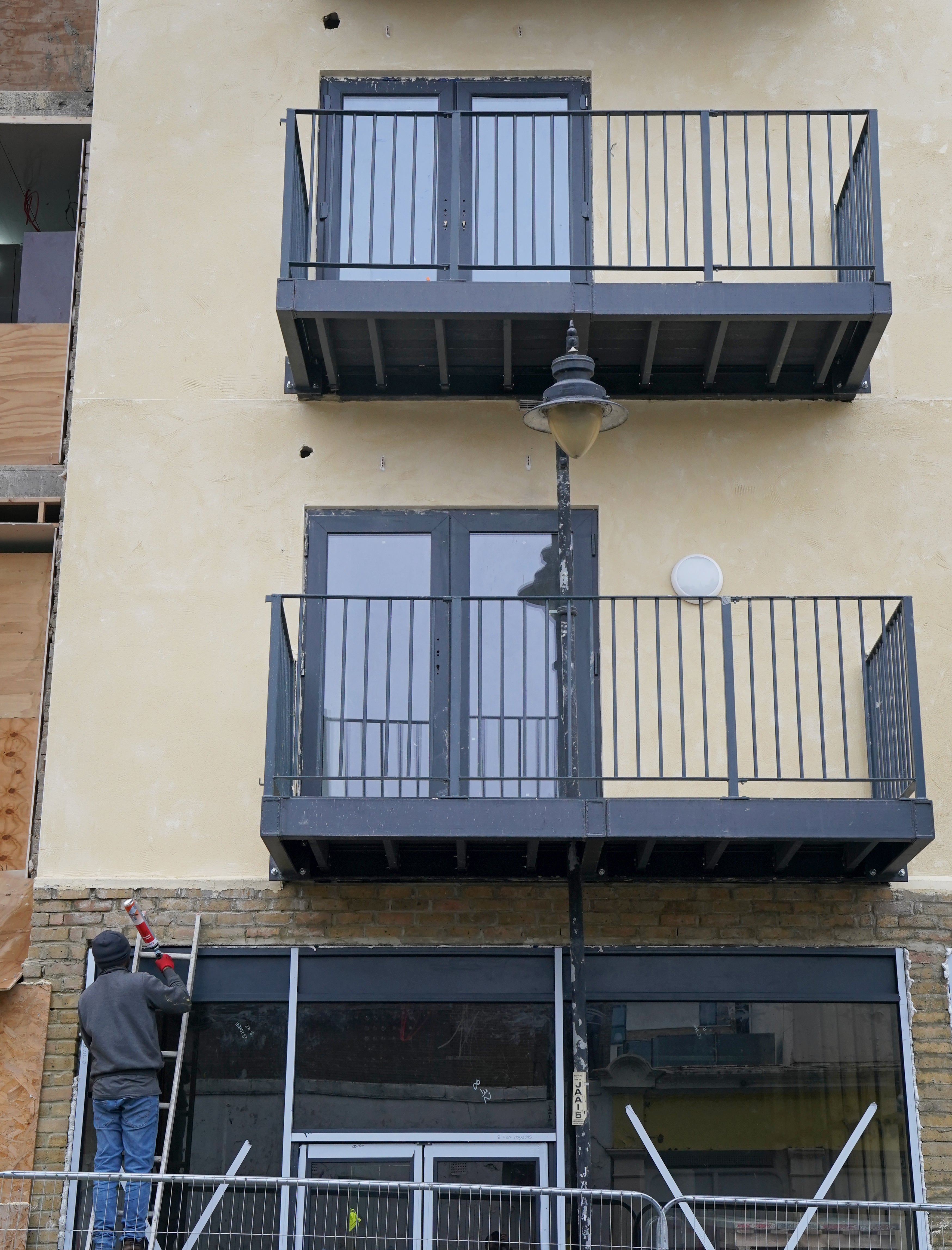 A view of Adisa House, a new block of flats under construction in Gillingham, Kent, where developers have had to build around an existing lamp post to remain within construction deadlines