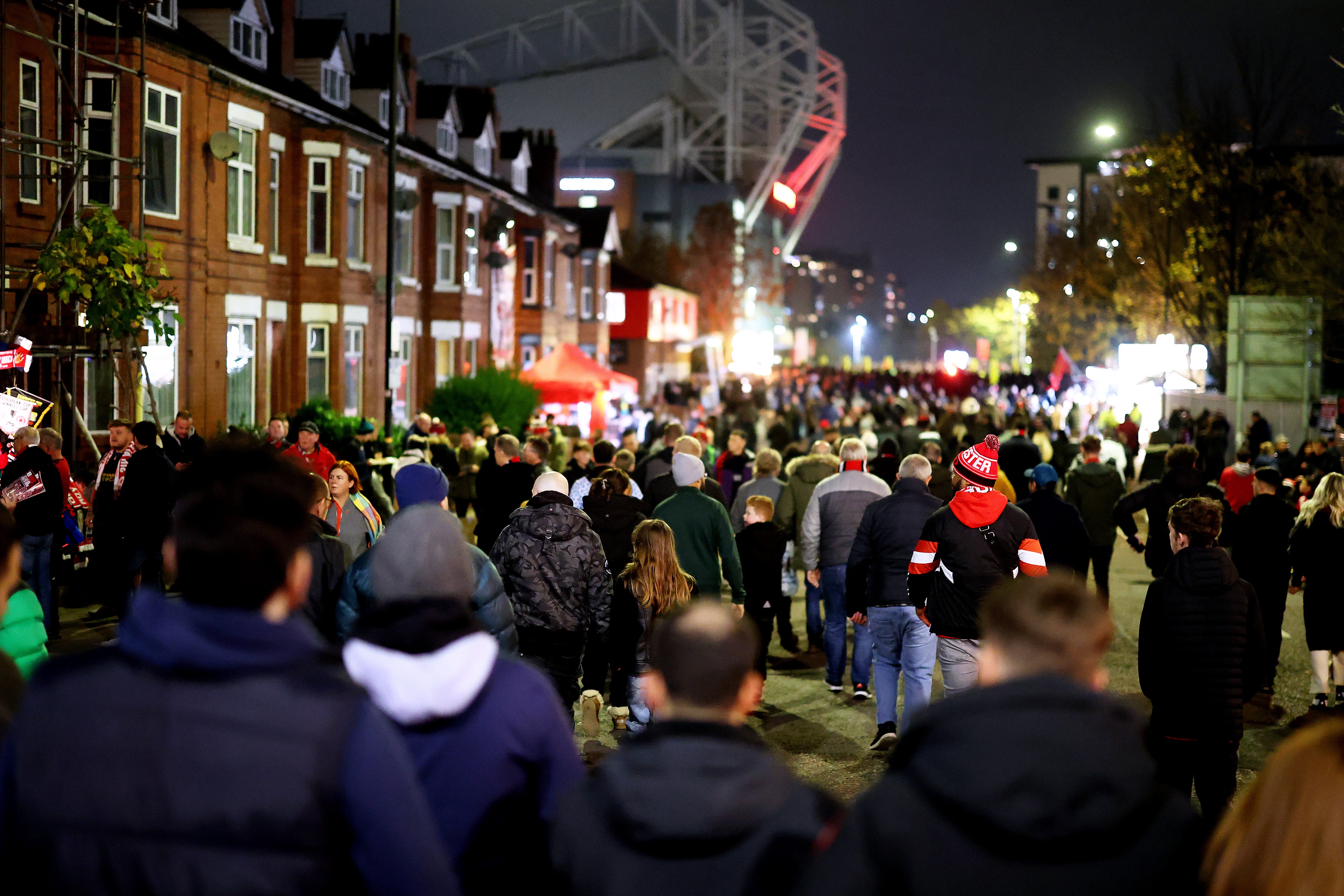 Manchester United fans arrive at Old Trafford for kick-off