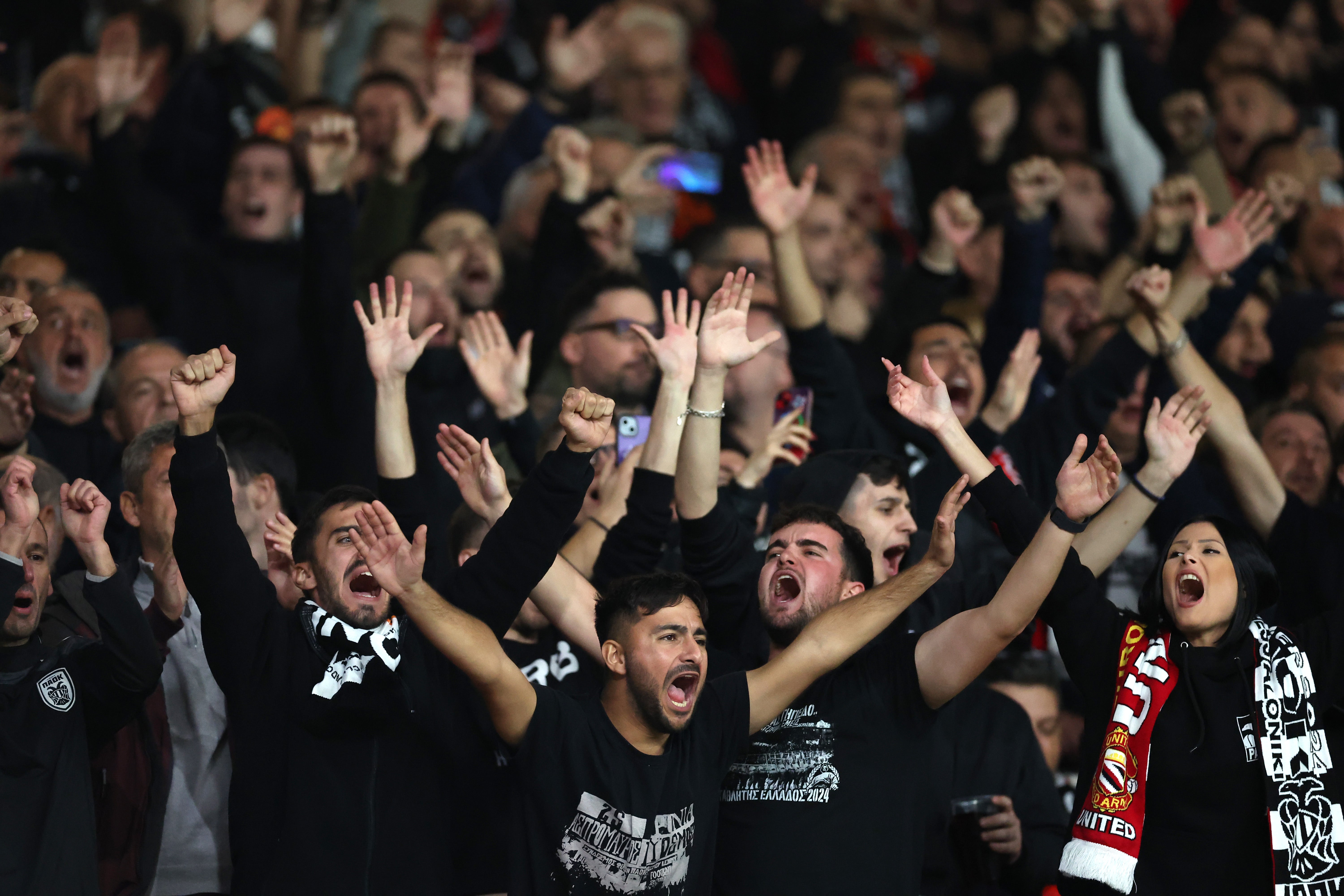 Greek fans make themselves heard at Old Trafford