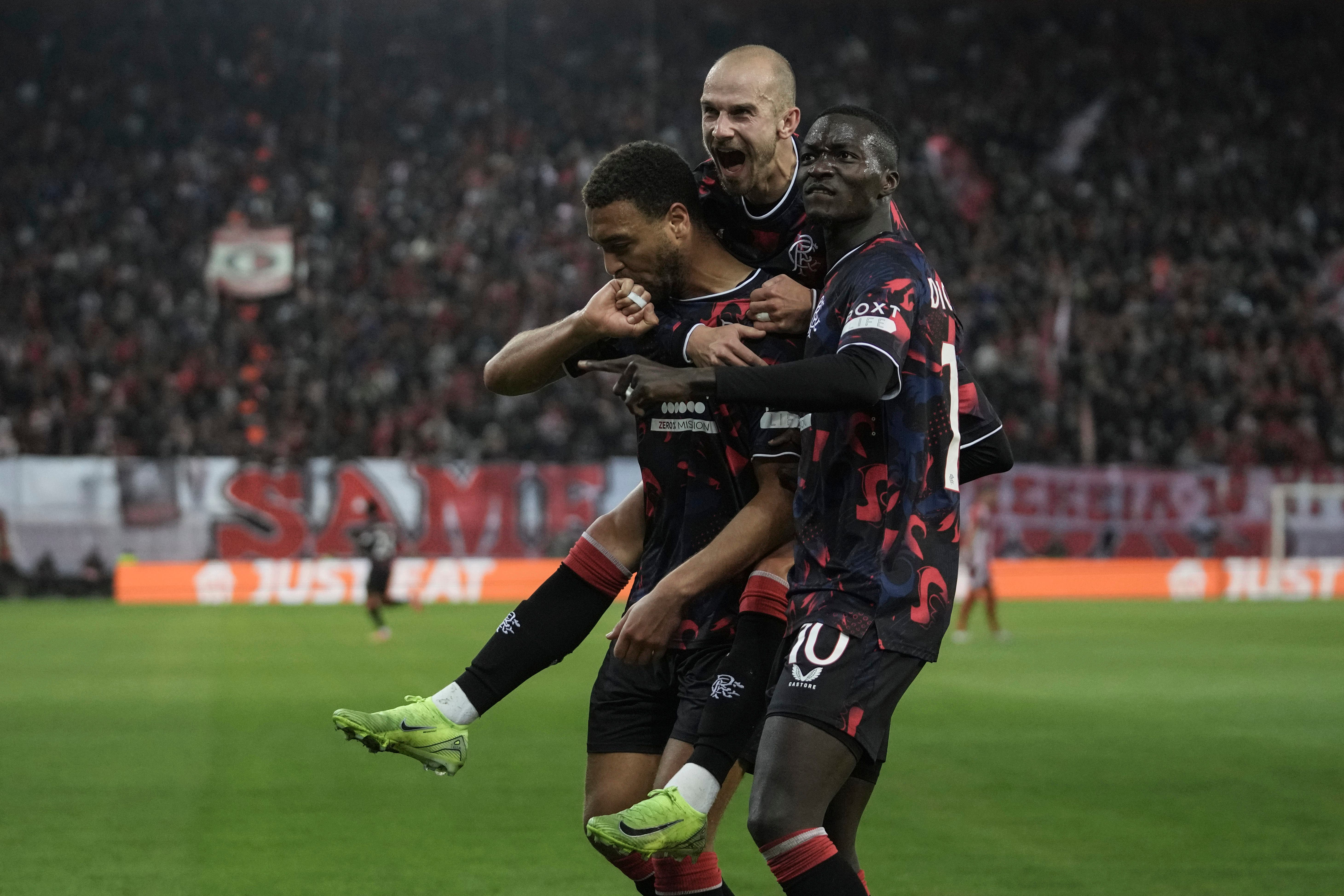 Cyriel Dessers celebrates his goal (Thanassis Stavrakis/AP)