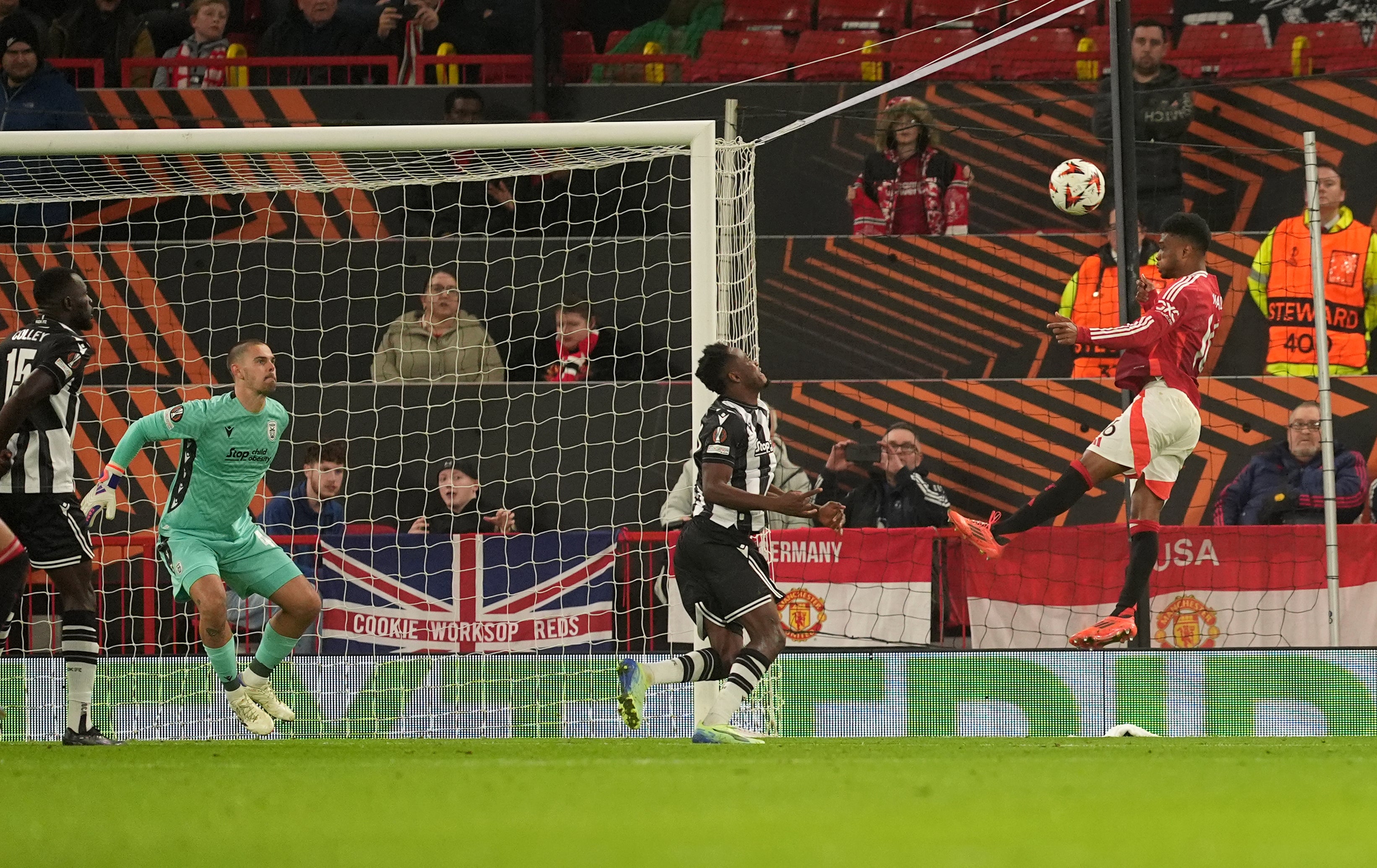 Amad Diallo heads home the opening goal (Martin Rickett/PA)