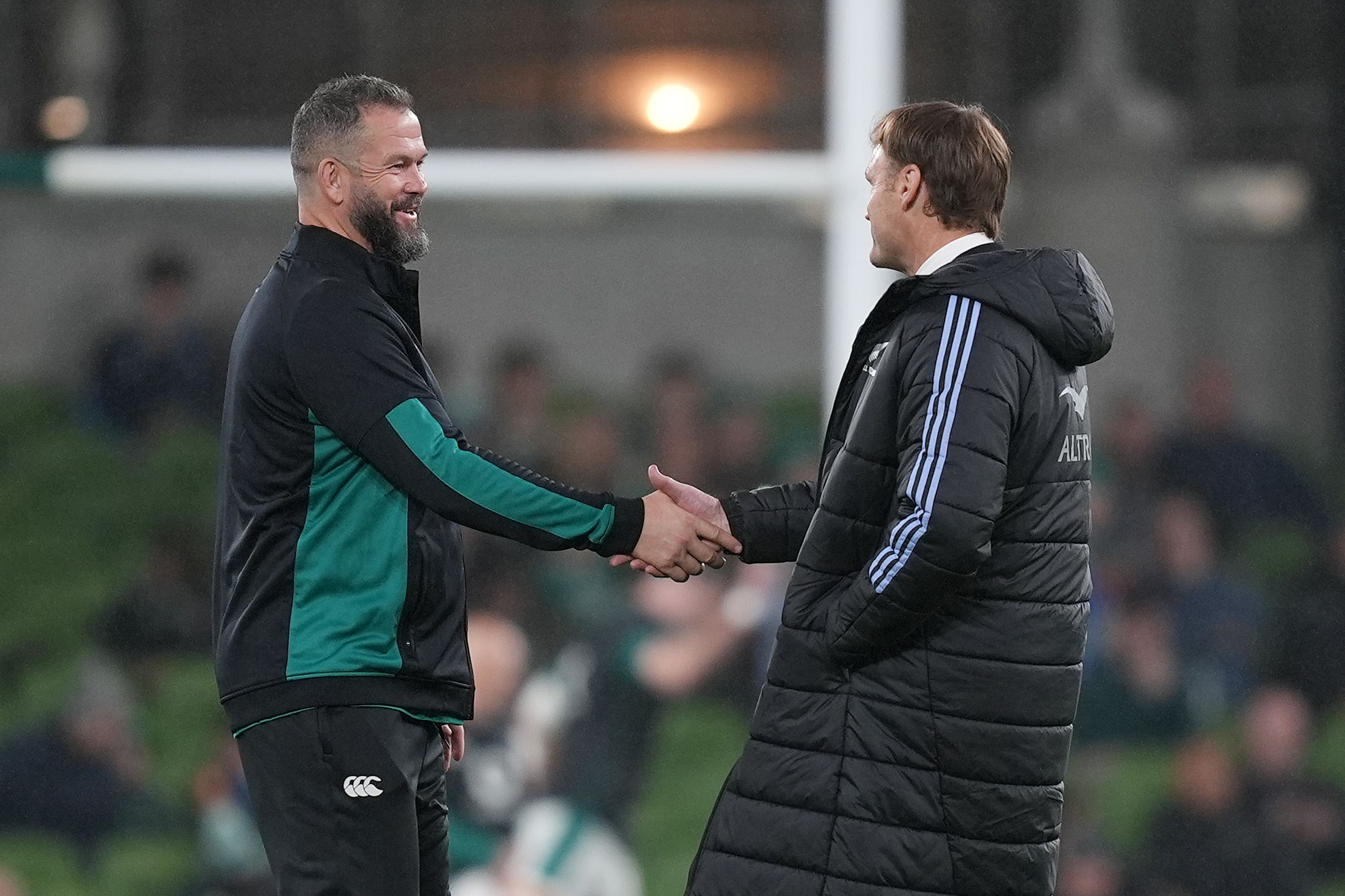 Ireland head coach Andy Farrell, left, greets New Zealand head coach Scott Robertson (Niall Carson/PA)