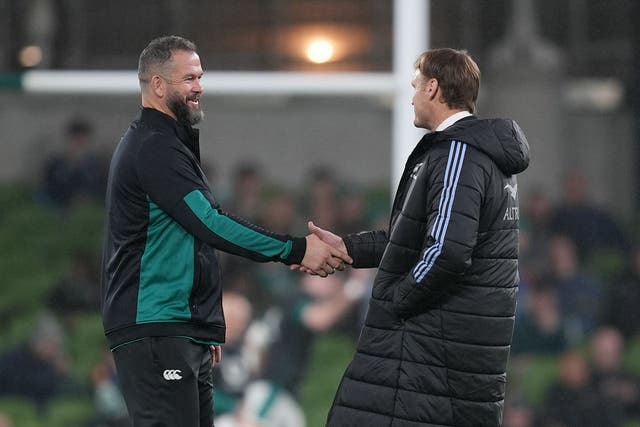 Ireland head coach Andy Farrell, left, greets New Zealand head coach Scott Robertson (Niall Carson/PA)