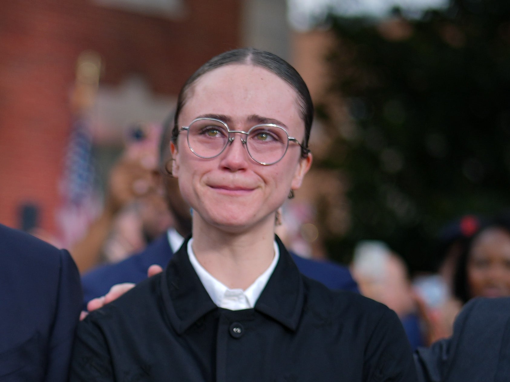 Ella Emhoff watches in tears as Kamala Harris gives a concession speech