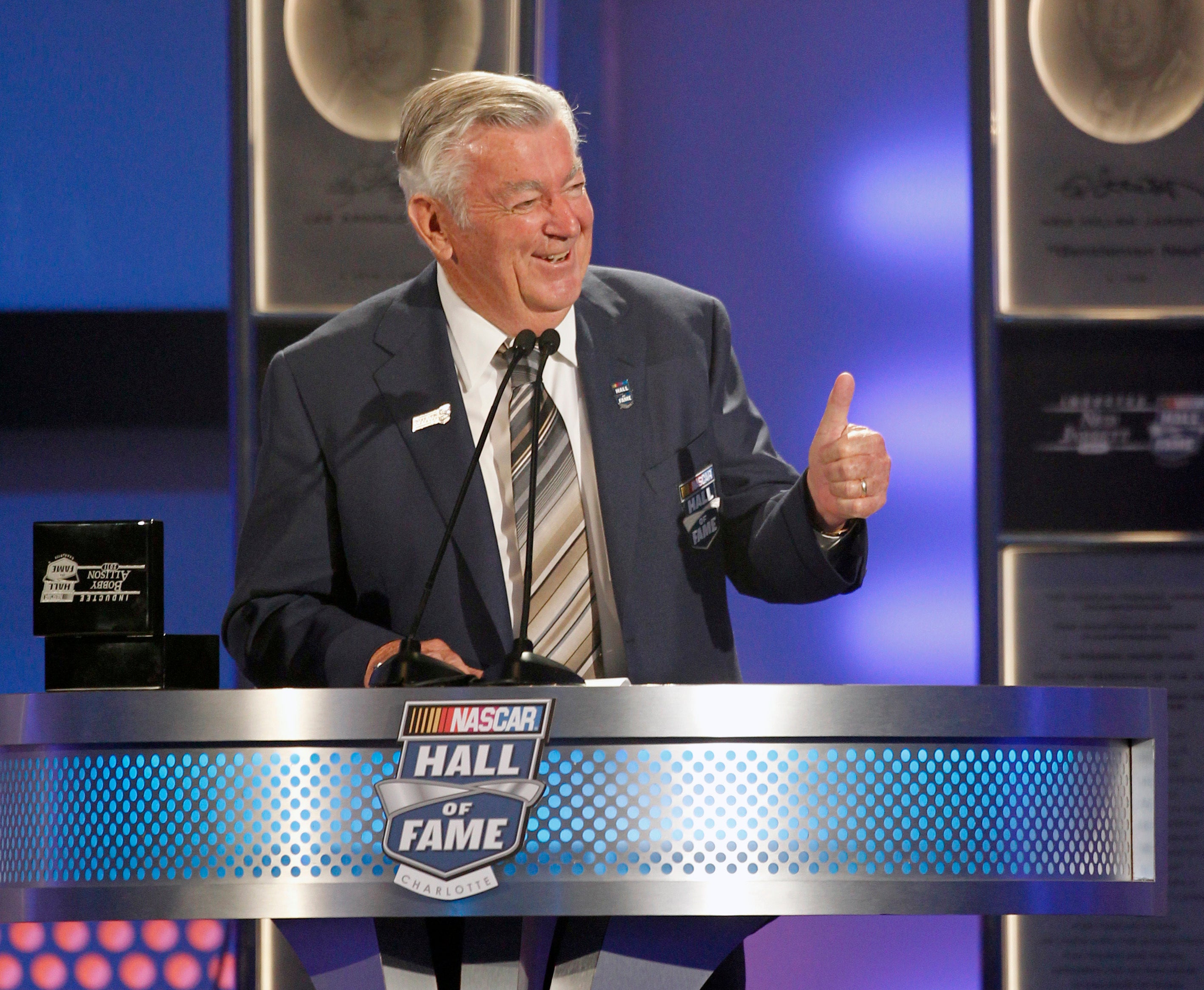 Bobby Allison speaks after being inducted into the NASCAR Hall of Fame in Charlotte in 2011