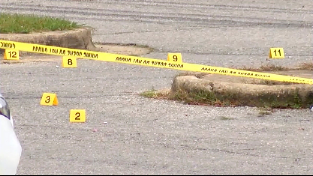 Evidence markers at the scene of the shooting