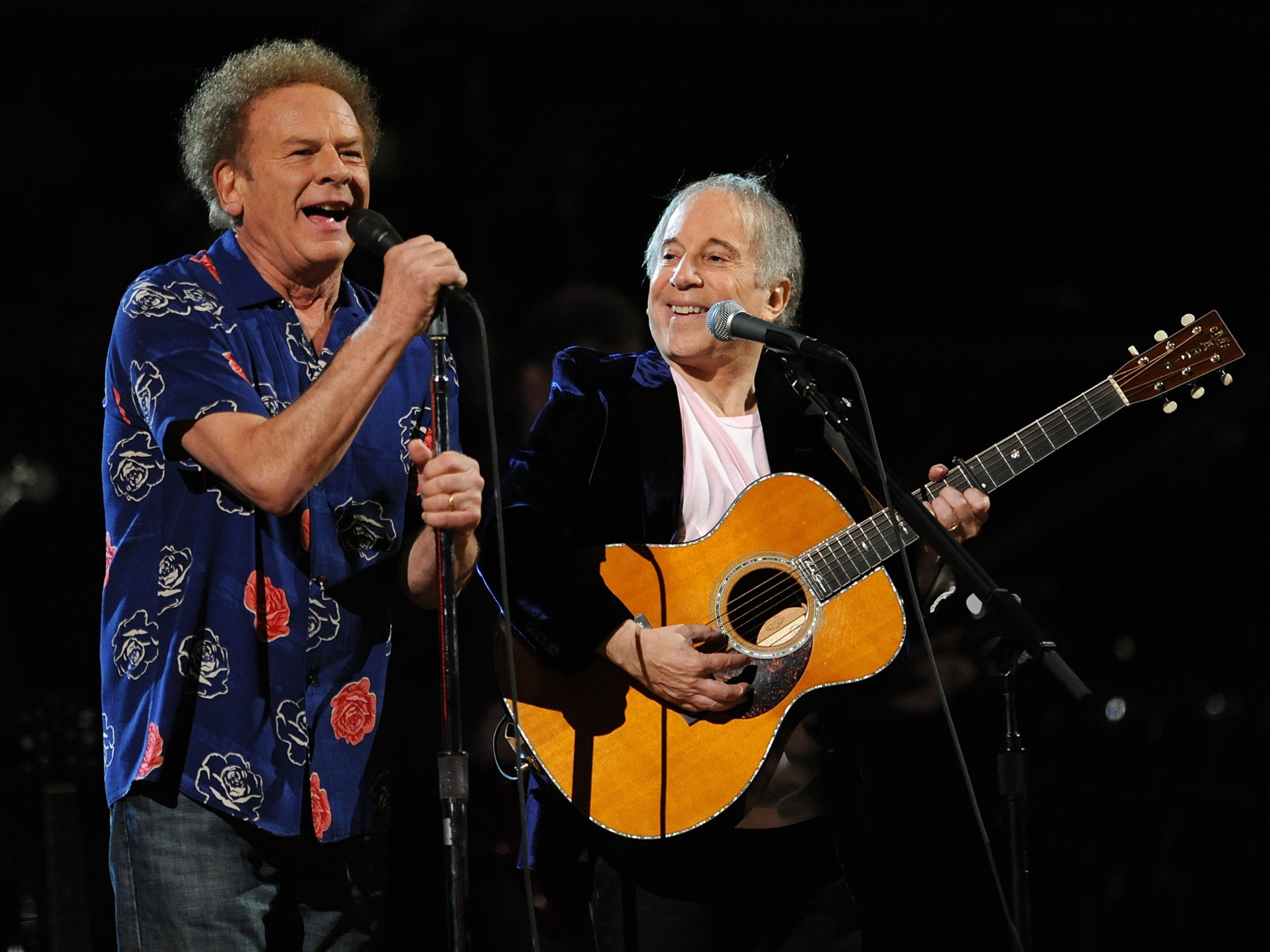 Art Garfunkel and Paul Simon performing onstage together at the Rock and Roll Hall of Fame concert at Madison Square Garden, New York, 2009