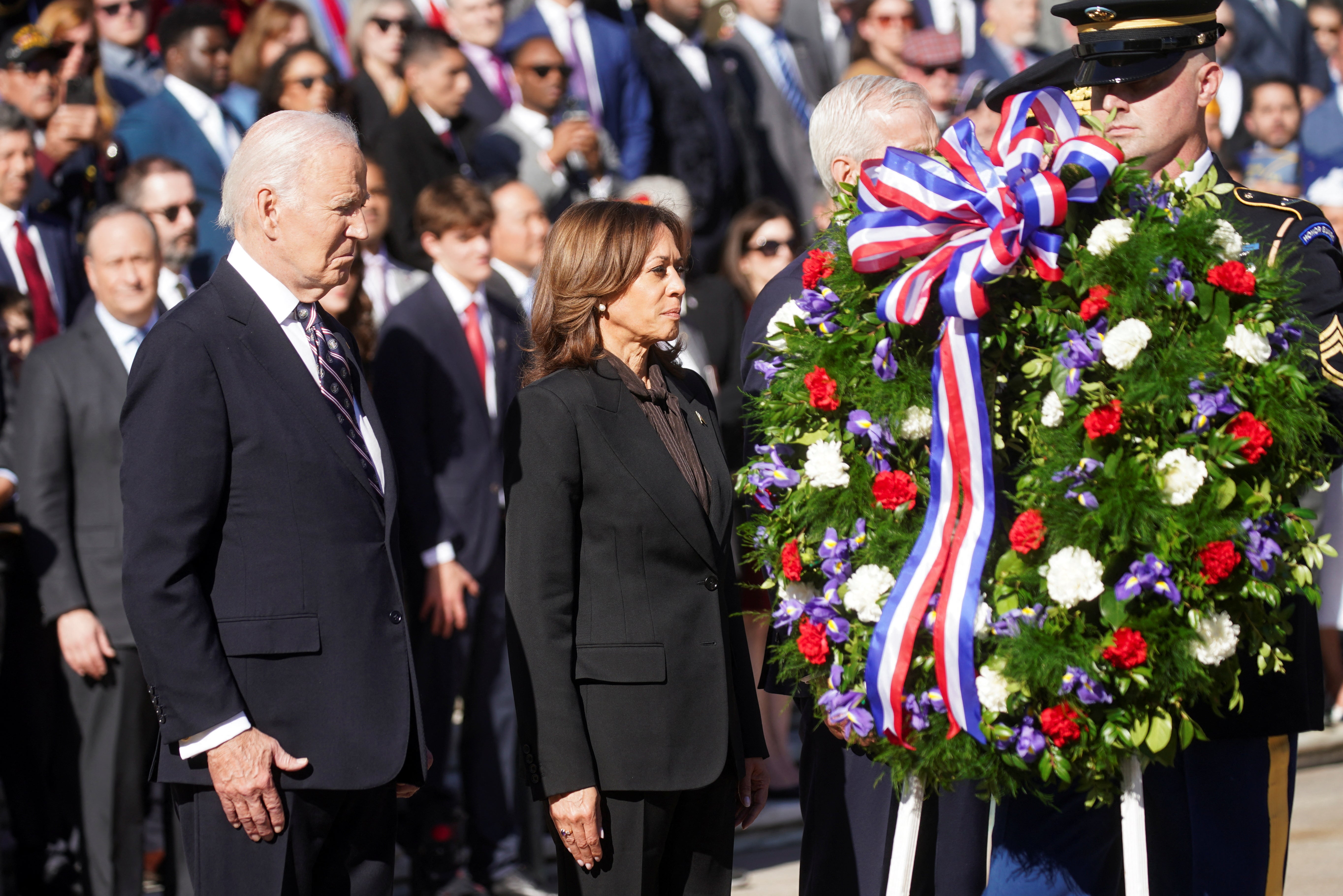 Joe Biden and Kamala Harris appear together at a Veterans Day ceremony at Arlington National Cemetary. It was their first appearance together since her Election Day loss