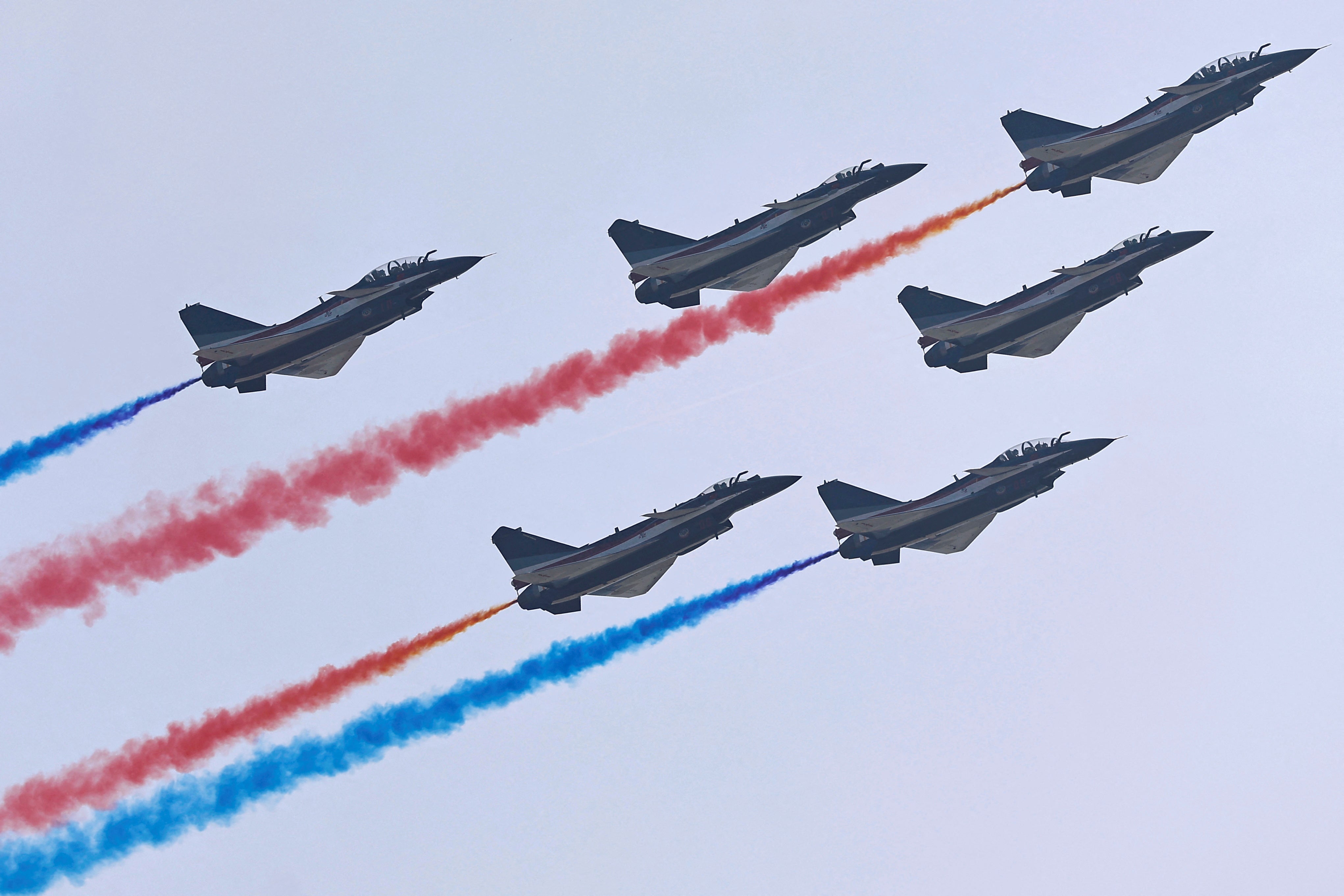 Fighter jets of the Chinese People’s Liberation Army (PLA) Air Force’s Bayi aerobatic team perform at the China International Aviation and Aerospace Exhibition