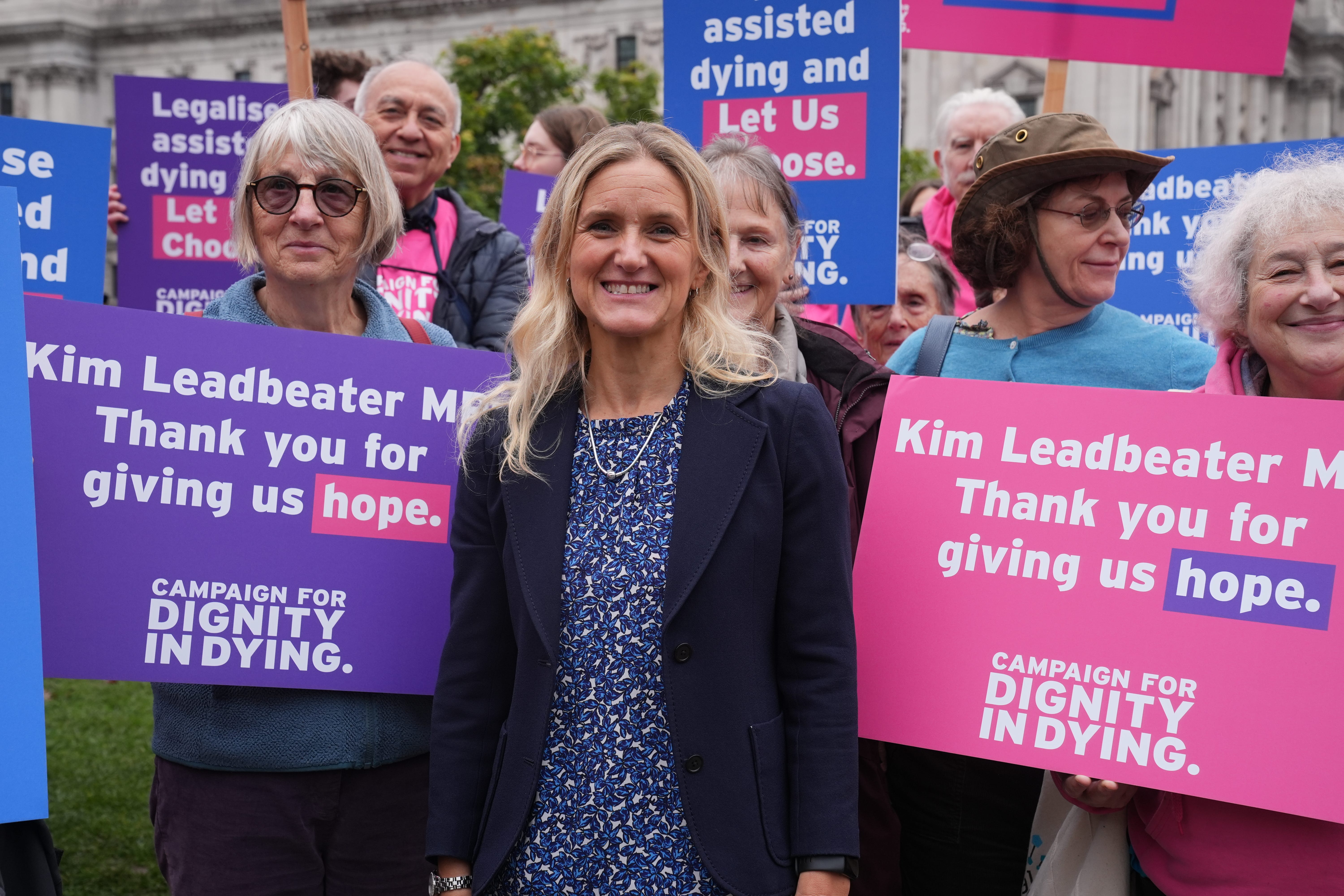 Labour MP Kim Leadbeater (centre) with Dignity in Dying campaigners as they gather in Parliament Square, central London, in support of the ‘assisted dying Bill’ (Lucy North/PA)