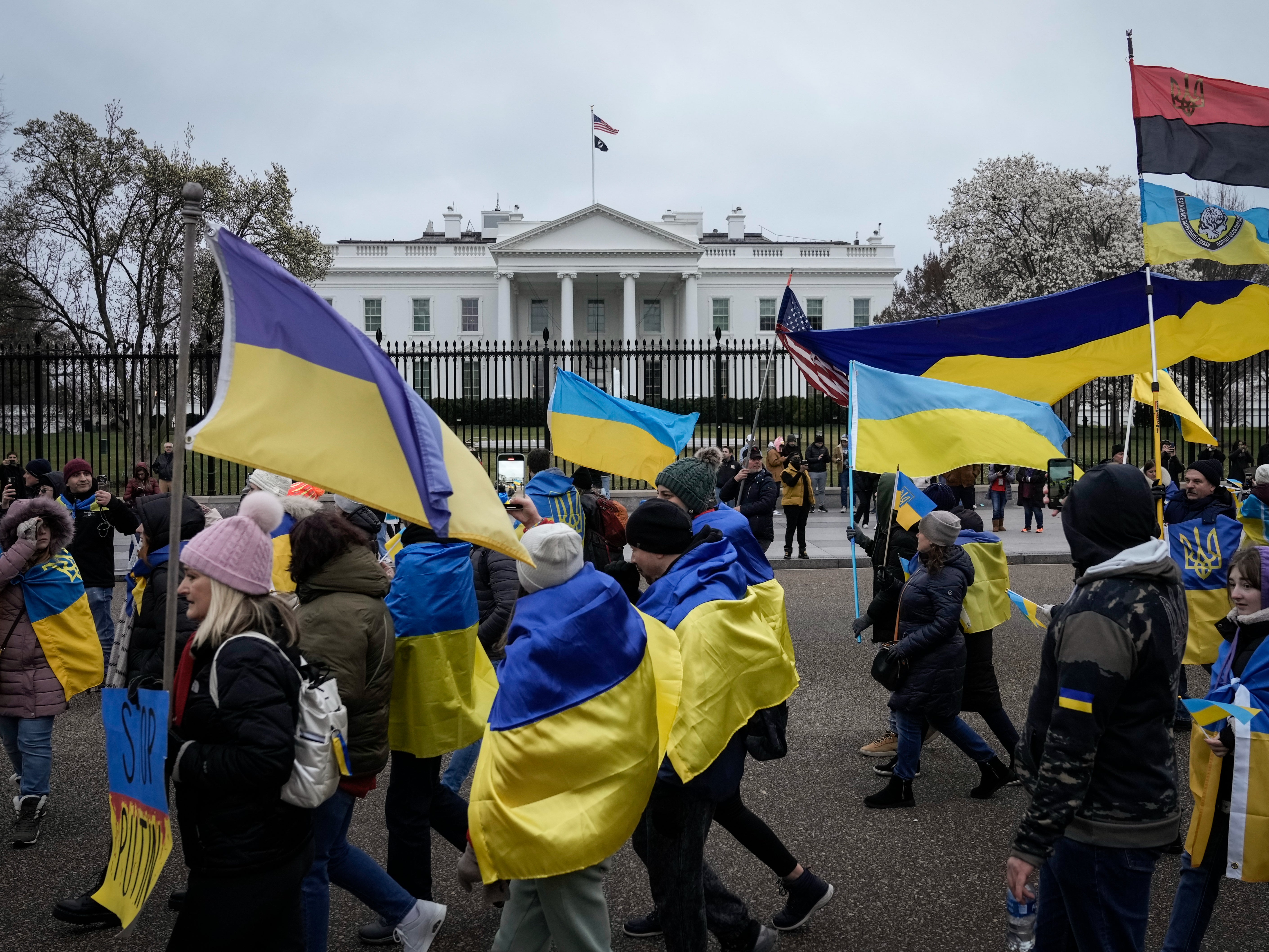 Supporters of Ukraine mark the one-year anniversary of Russia’s invasion outside the White House