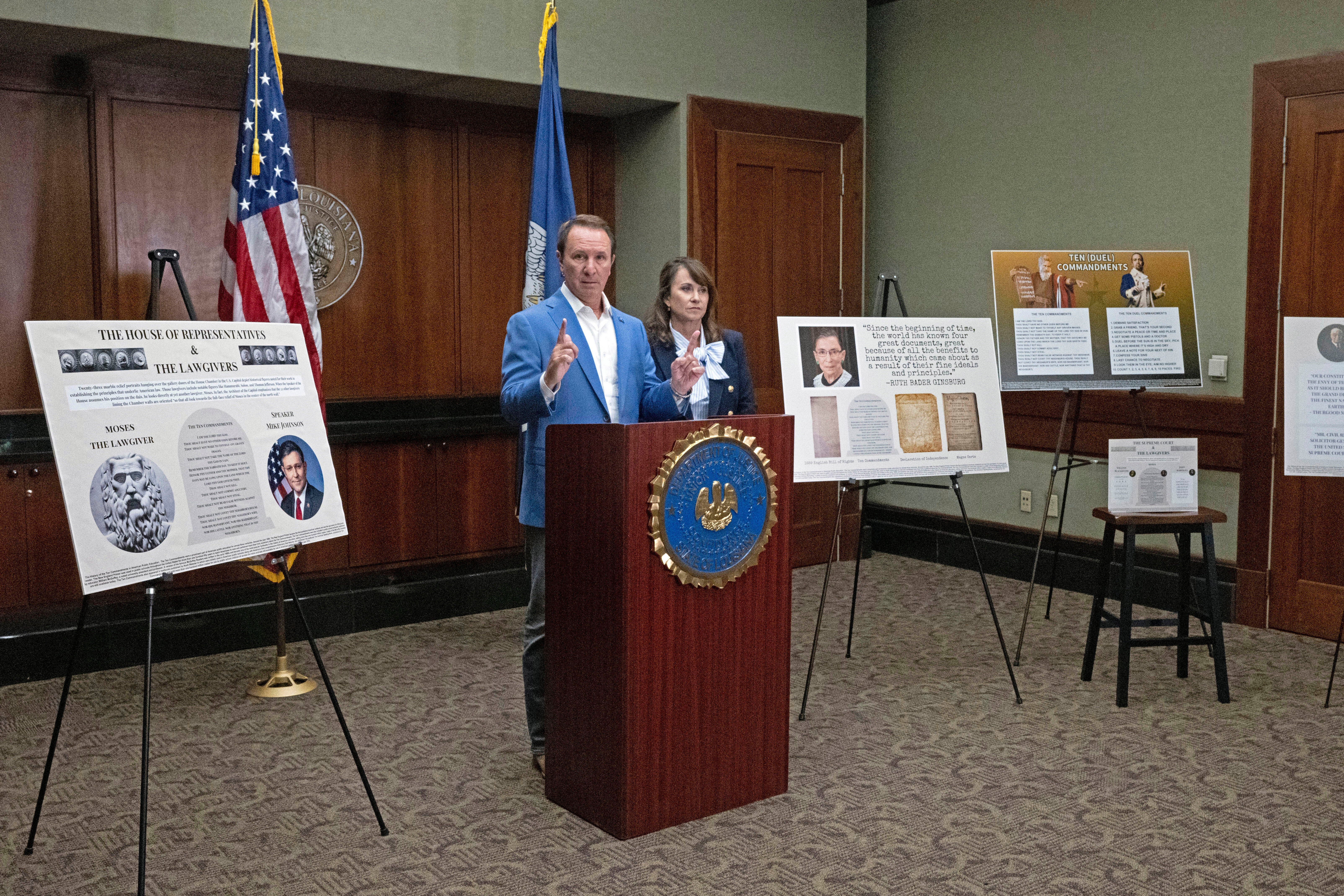 Louisiana Governor Jeff Landry speaks alongside Louisiana Attorney General Liz Murrill during an August press conference on state law requiring the Ten Commandments in schools