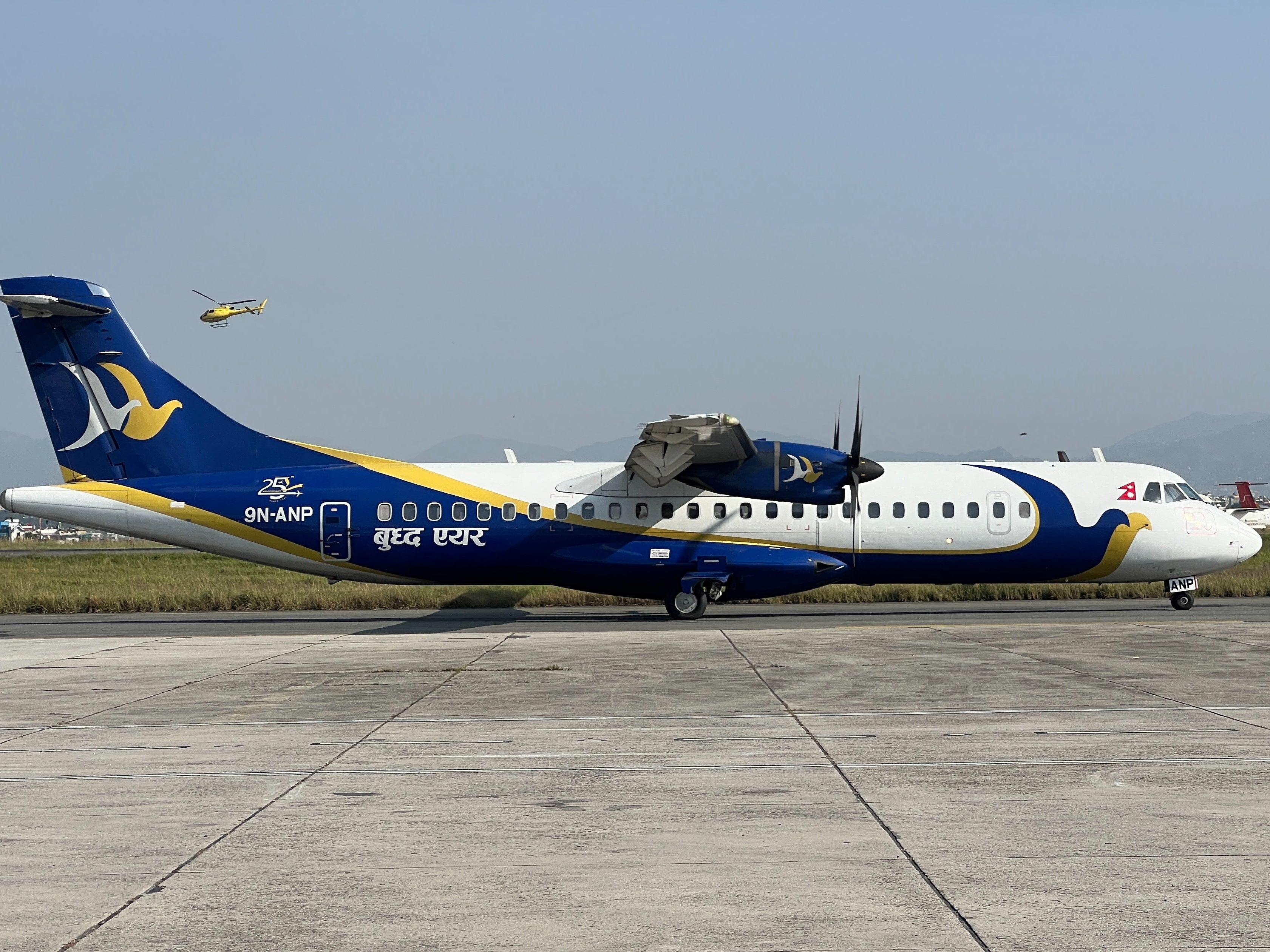 Flight path to enlightenment: Buddha Air plane at Kathmandu airport