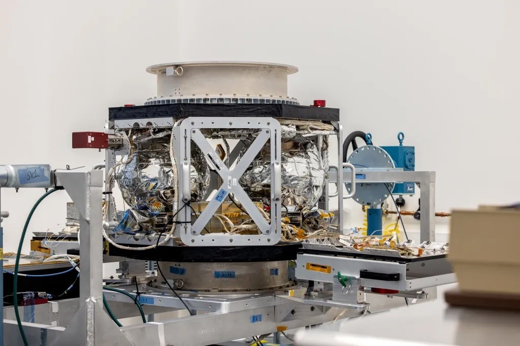 A completed satellite for the TRACERS mission sits on a support structure. The satellite will launch no sooner than April of next year.