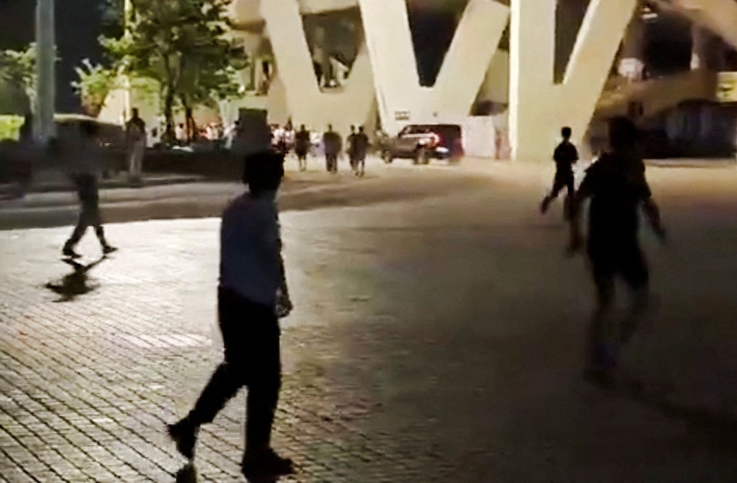 A view shows a car moments before it rammed into a group of people on the road outside a sports centre in Zhuhai