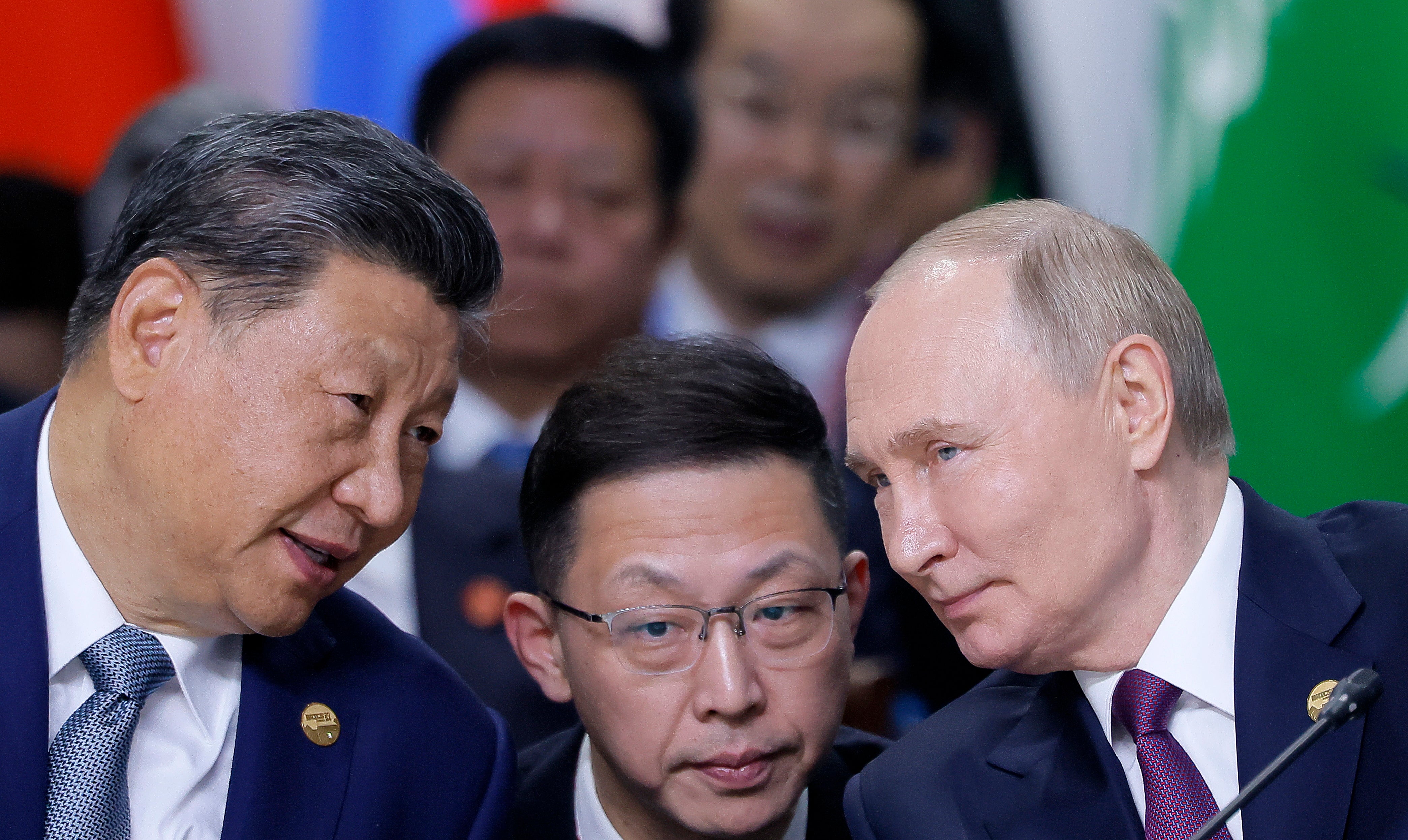 Chinese president Xi Jinping and Vladimir Putin speak at a summit in Kazan, Russia in October