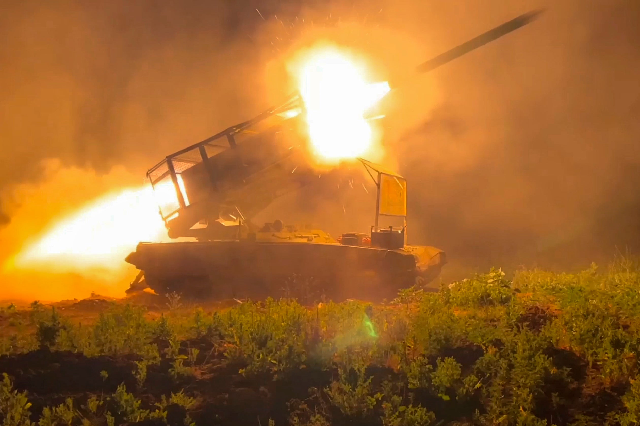 The Russian army's multiple rocket launcher Solntsepyok fires towards Ukrainian positions in the Kursk region