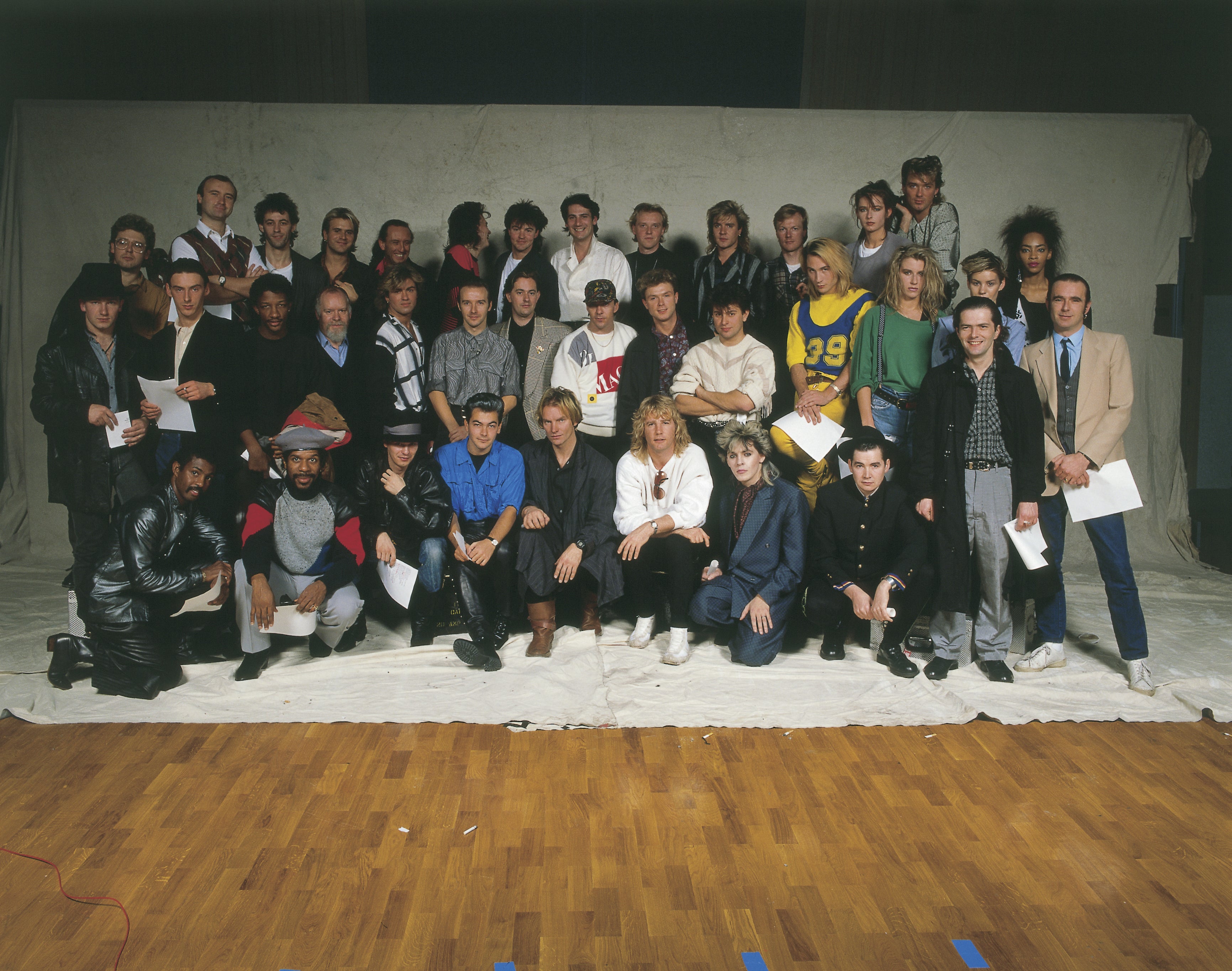 Sir Bob Geldof along with other artists recording the first ever Band Aid single