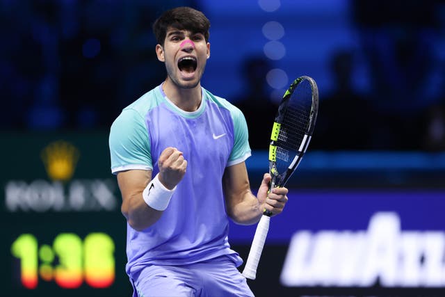 <p>Carlos Alcaraz wore pink nasal tape as he battles an illness at the ATP Finals </p>