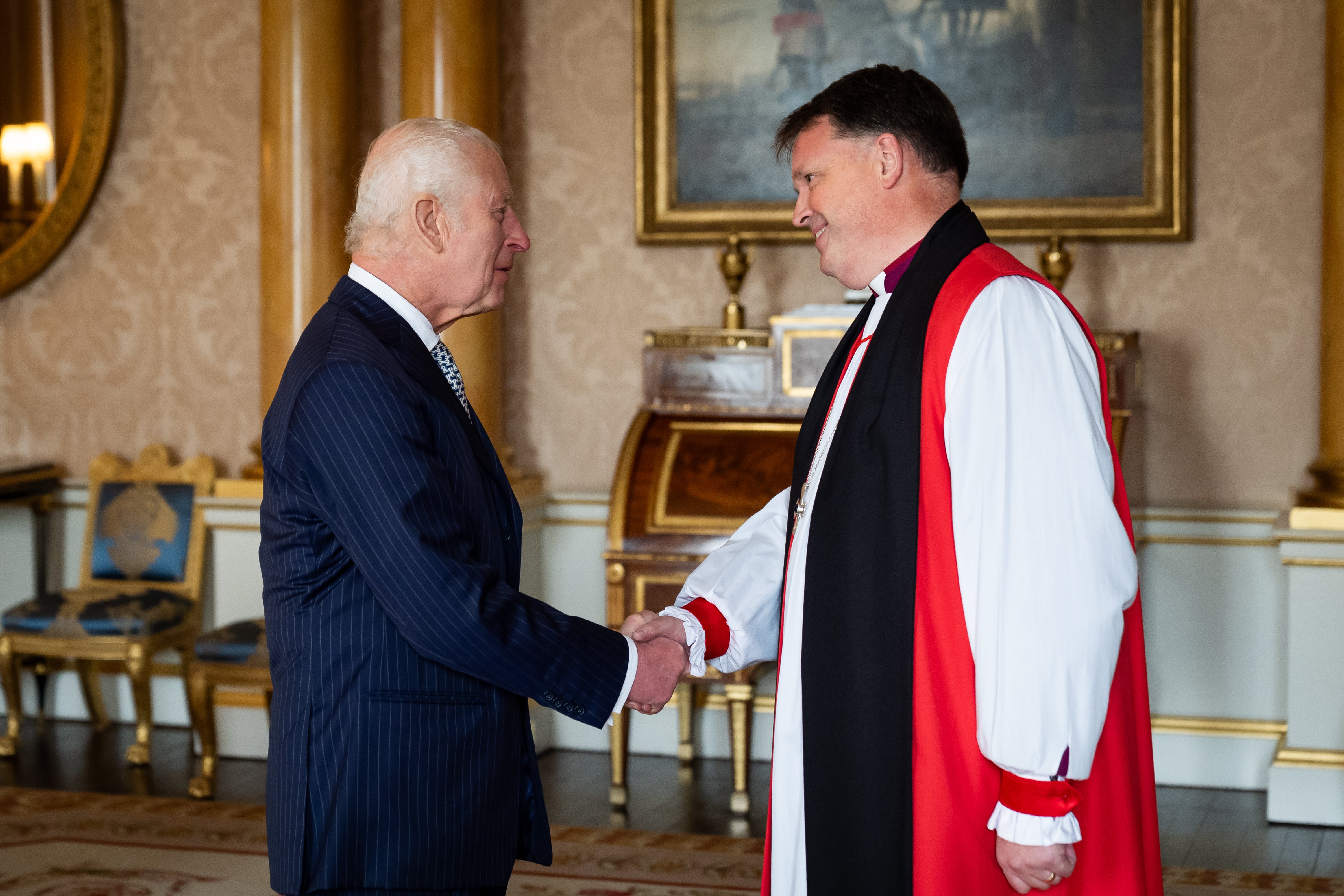 The King with bishop Graham Usher, one of the favourites to succeed Welby