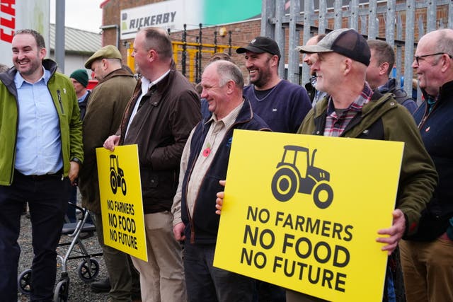 <p>Farmers protesting outside the Northern Farming Conference in Hexham, Northumberland, against the proposals to reform inheritance tax </p>