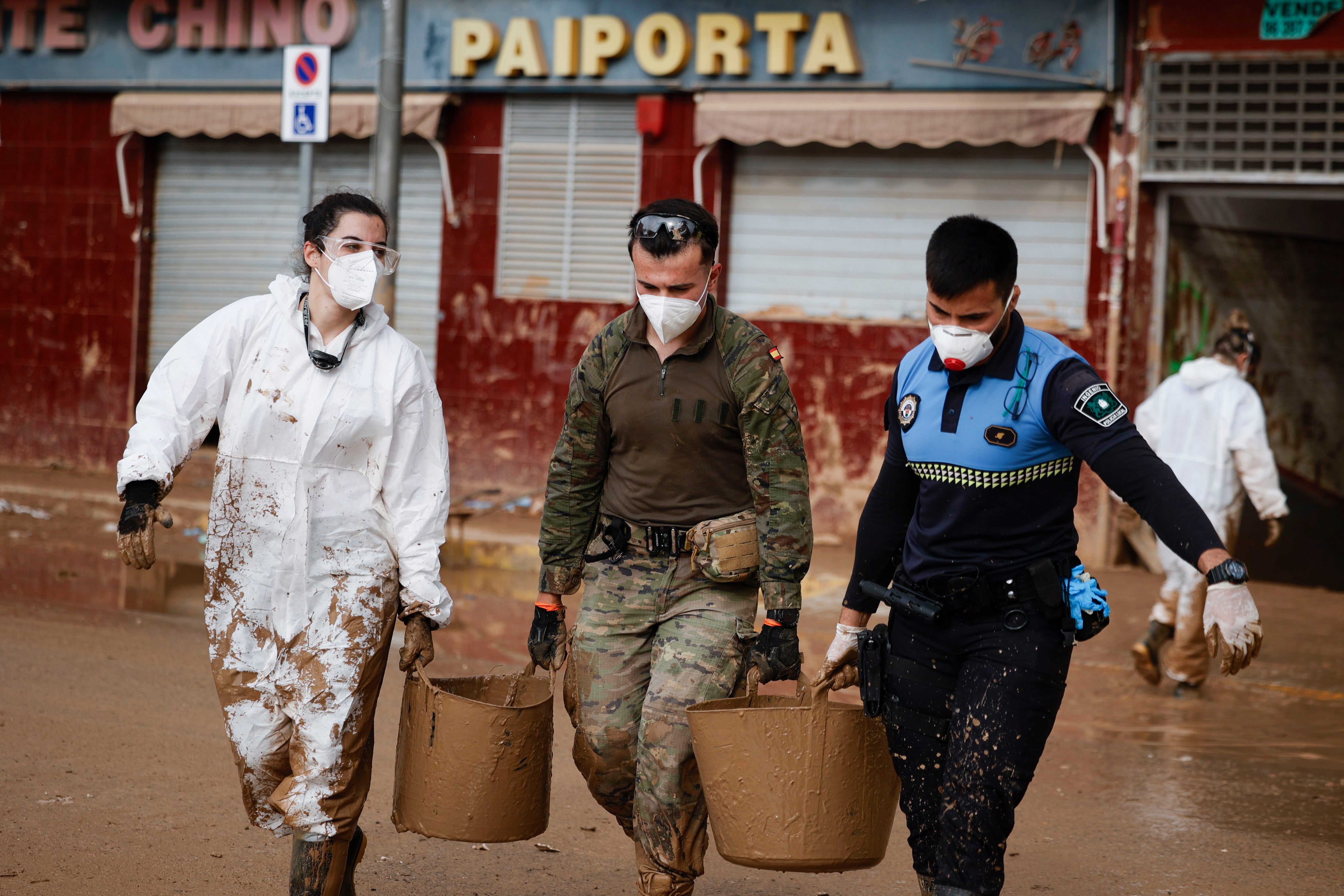 Police, military and volunteers continue with cleaning operations in the flood-hit municipality of Paiporta