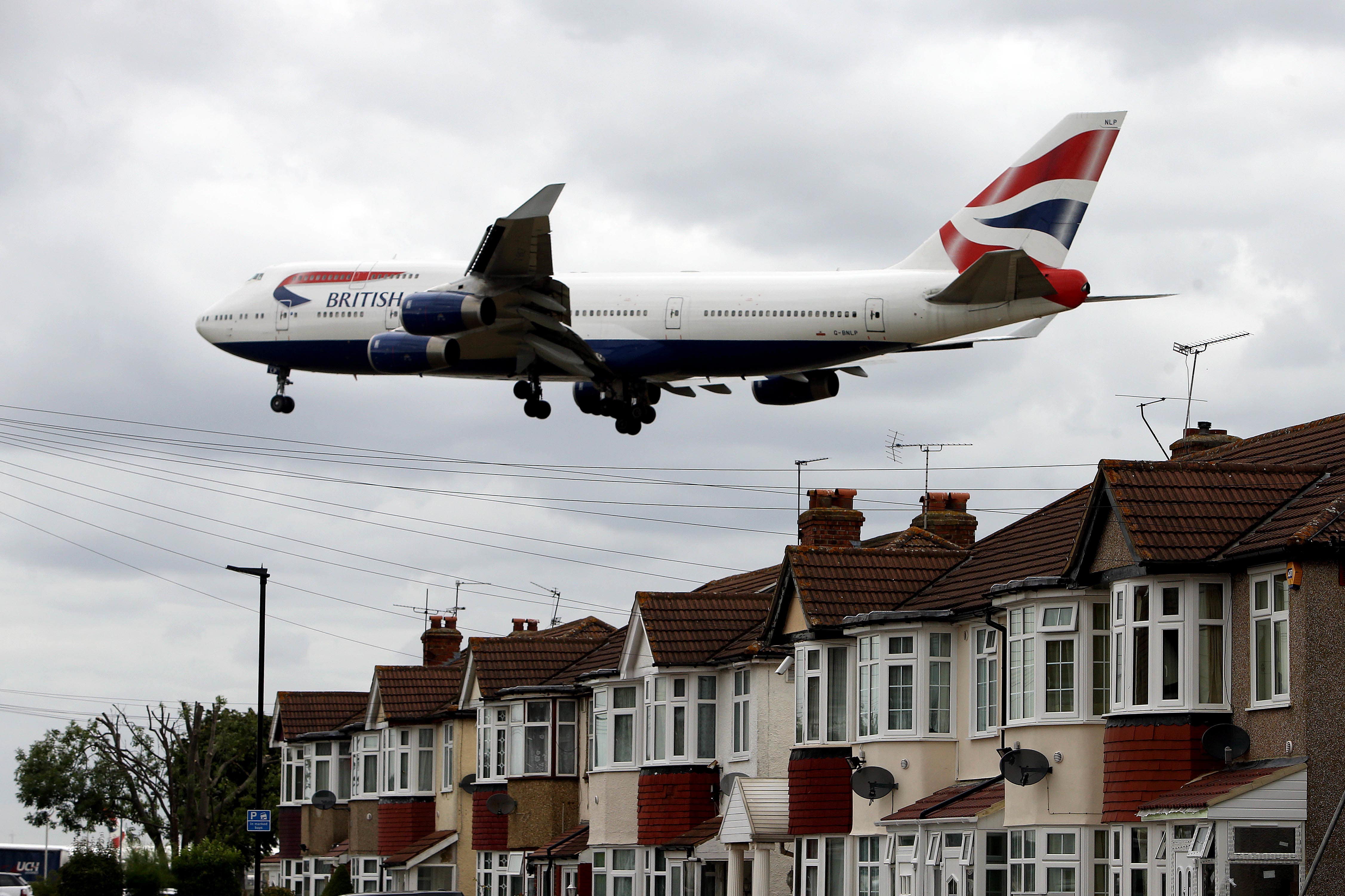 A British Airways plane over West London on the approach to Heathrow Airport (Steve Parsons/PA)