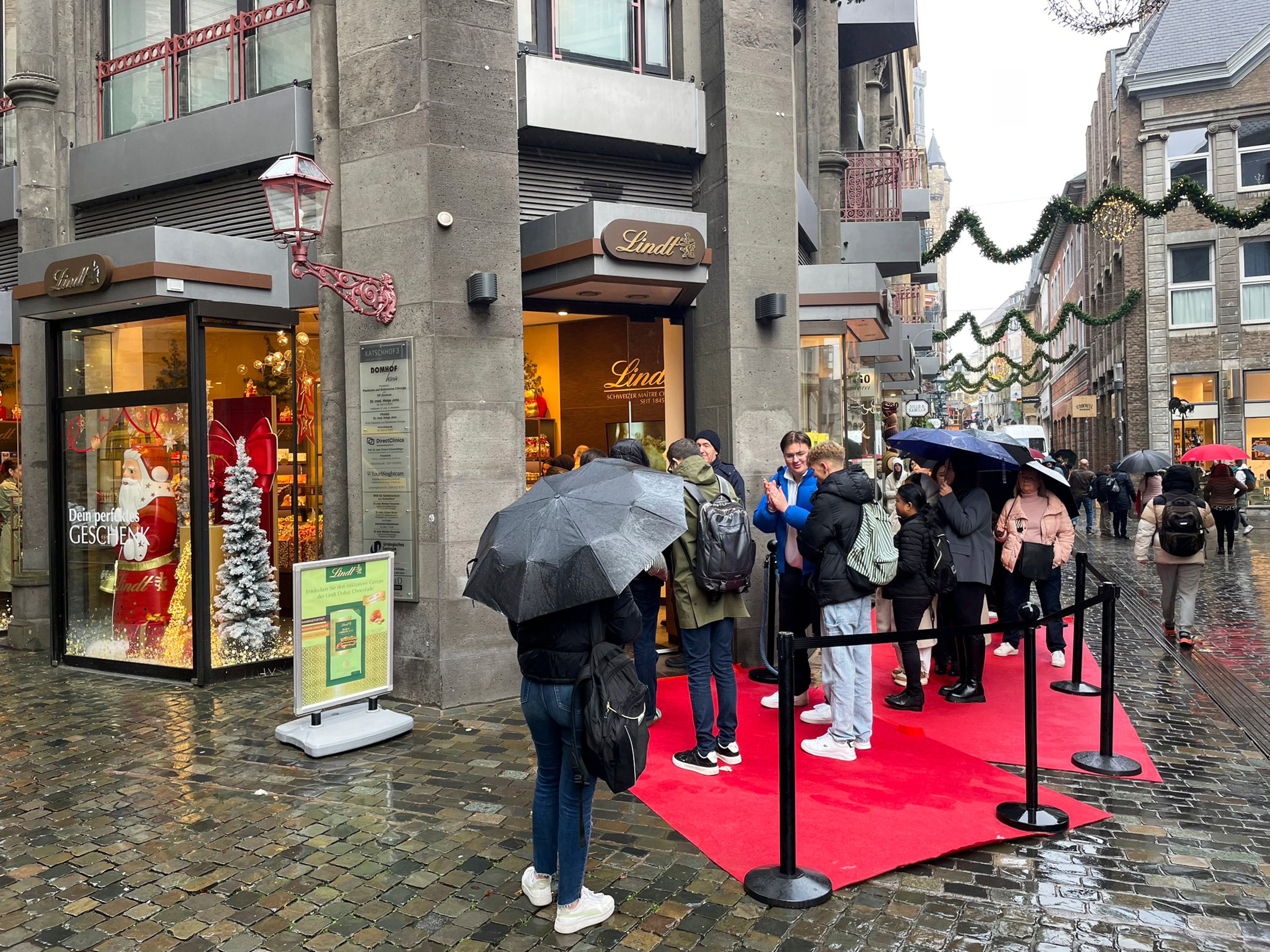 People queue outside of a Lindt chocolate shop to buy limited bars ‘Dubai Chocolate’, in Aachen, Germany