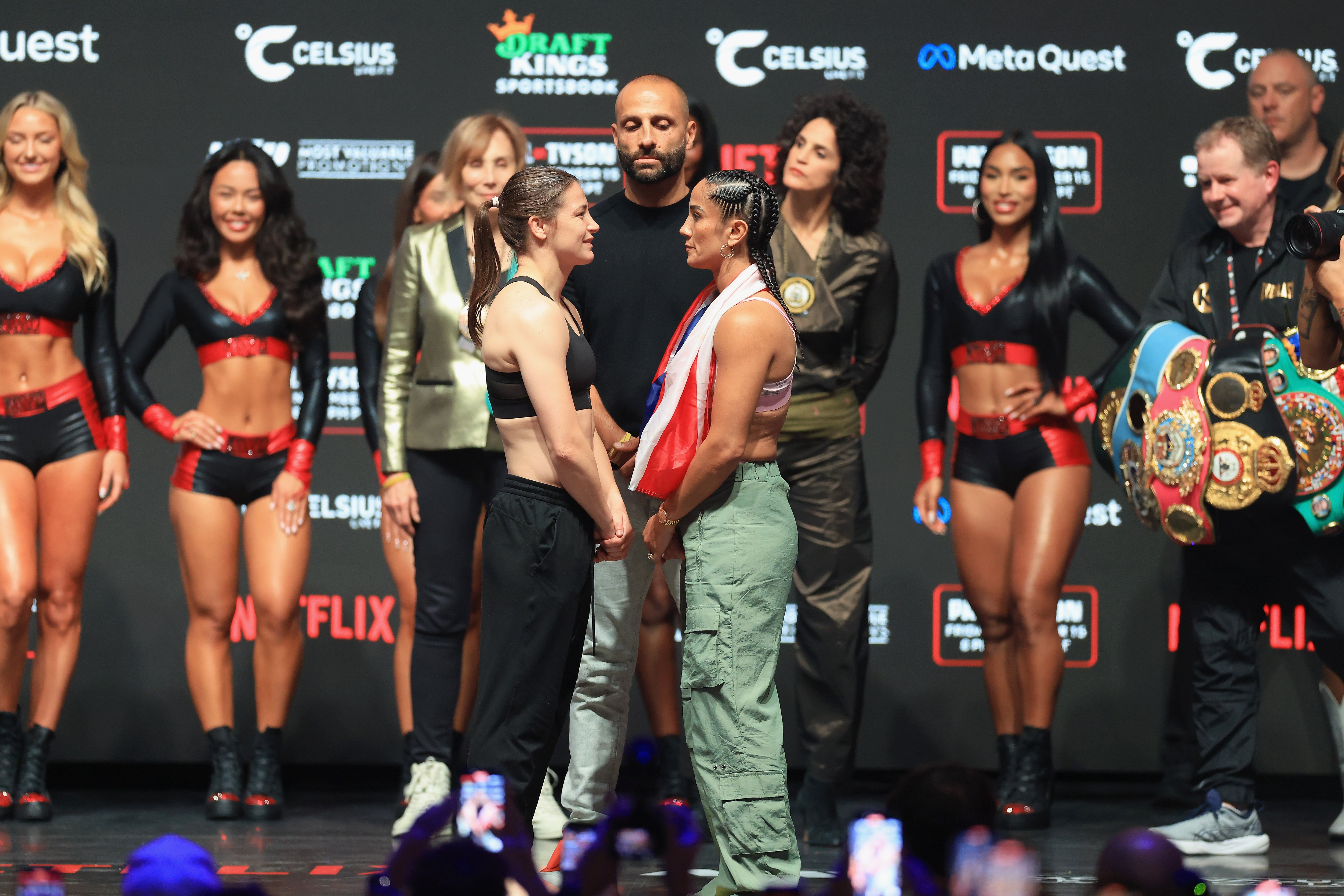 Katie Taylor (centre-left) faces off with Amanda Serrano before their rematch