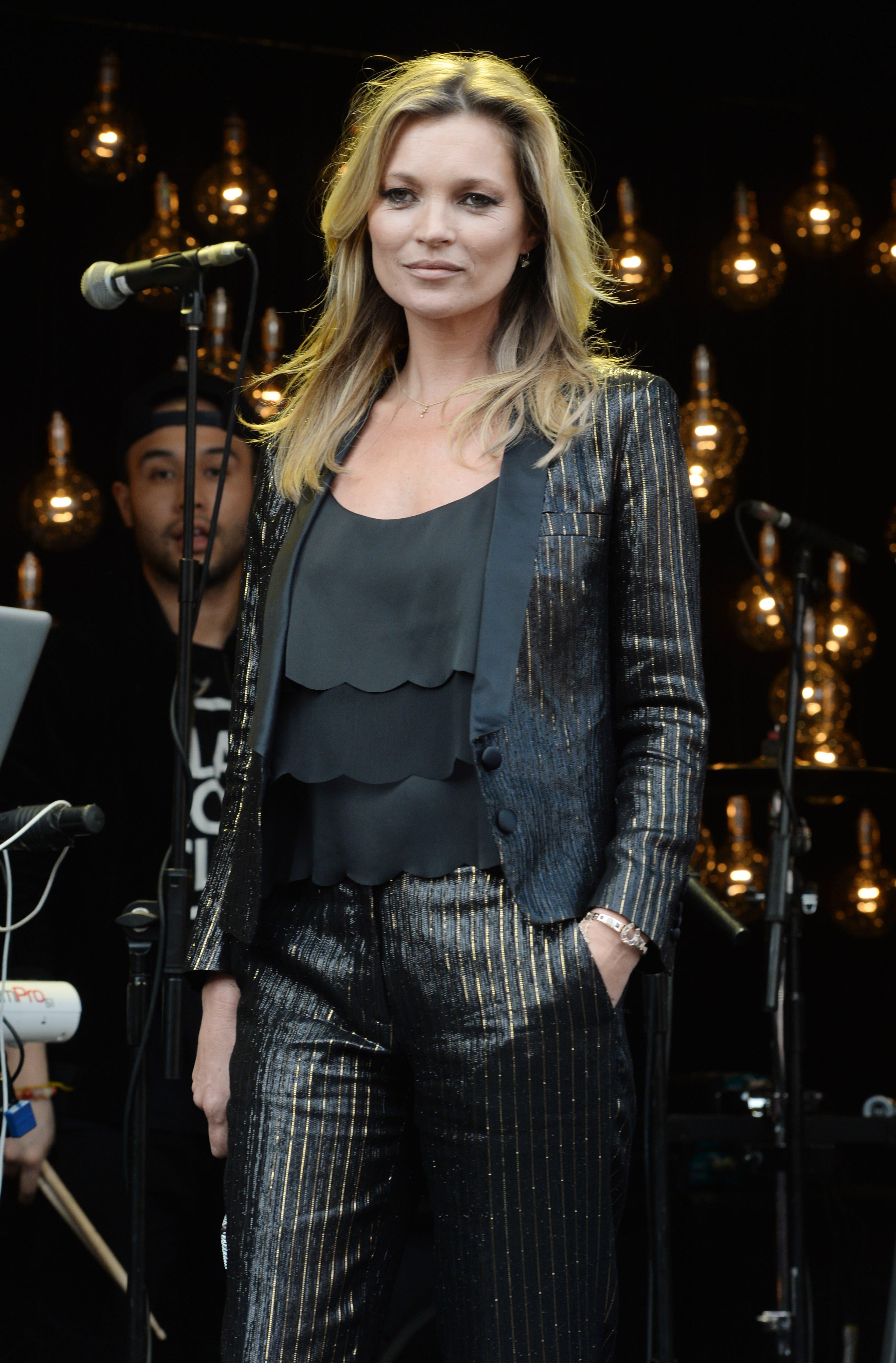 Moss took to a stage on Oxford Street to launch her one-off Topshop collection in 2014 (Alamy/PA)