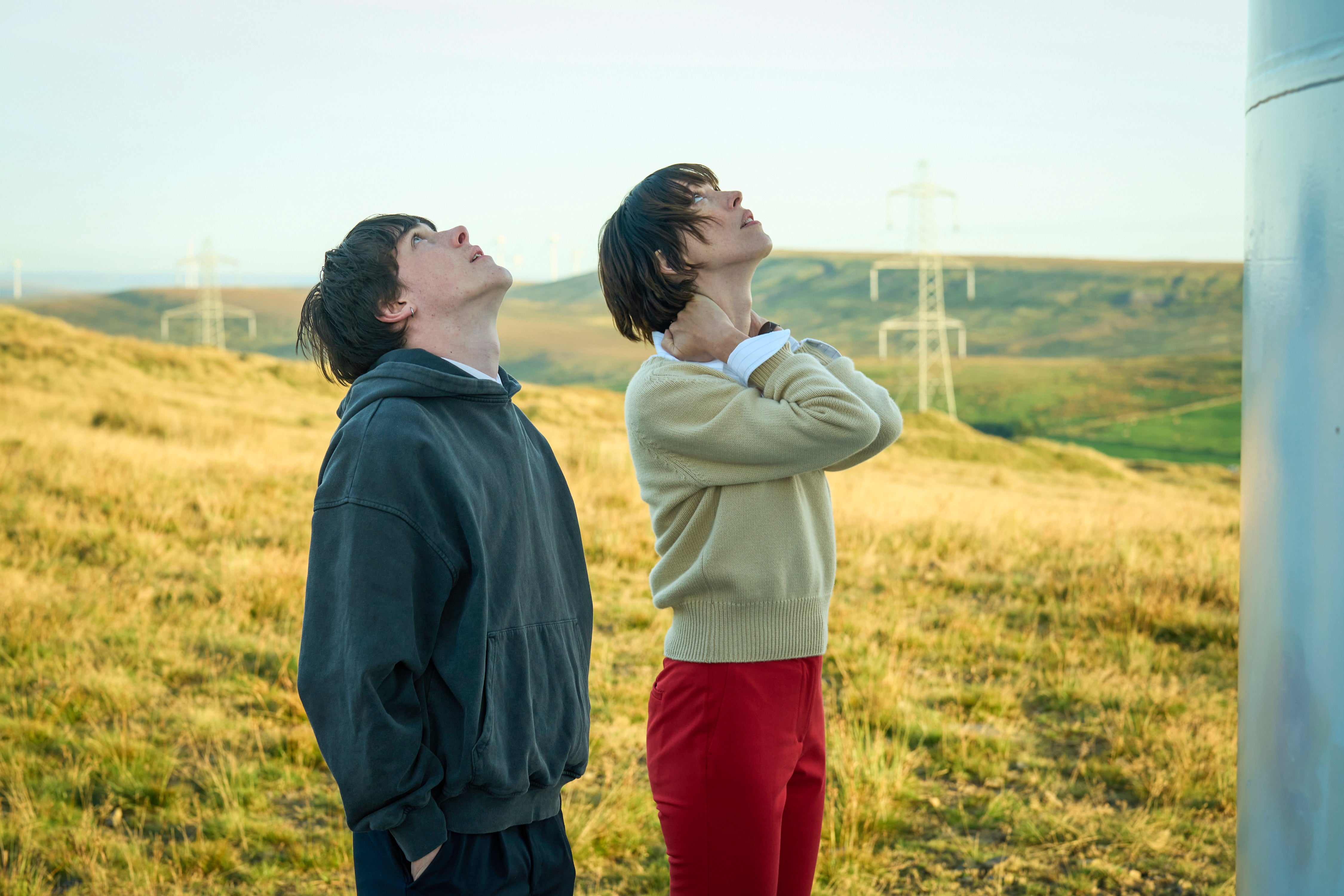 Claire and Kyle (Ollie West) try to figure out what the sound is in ‘The Listeners’