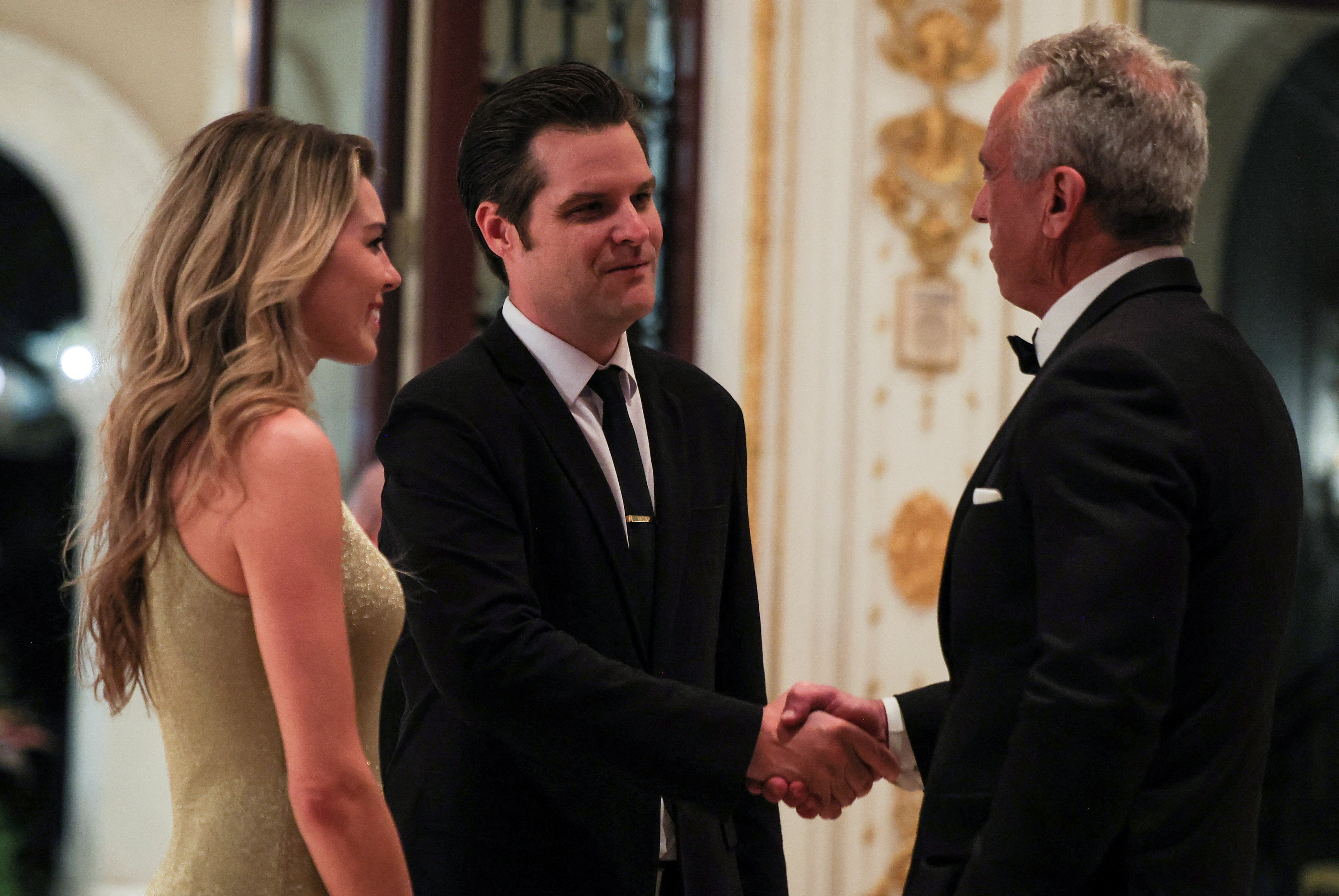 Nominated Attorney General Matt Gaetz (L) shakes hands with nominated lead of Department of Health and Human Services RFK Jr on Thursday