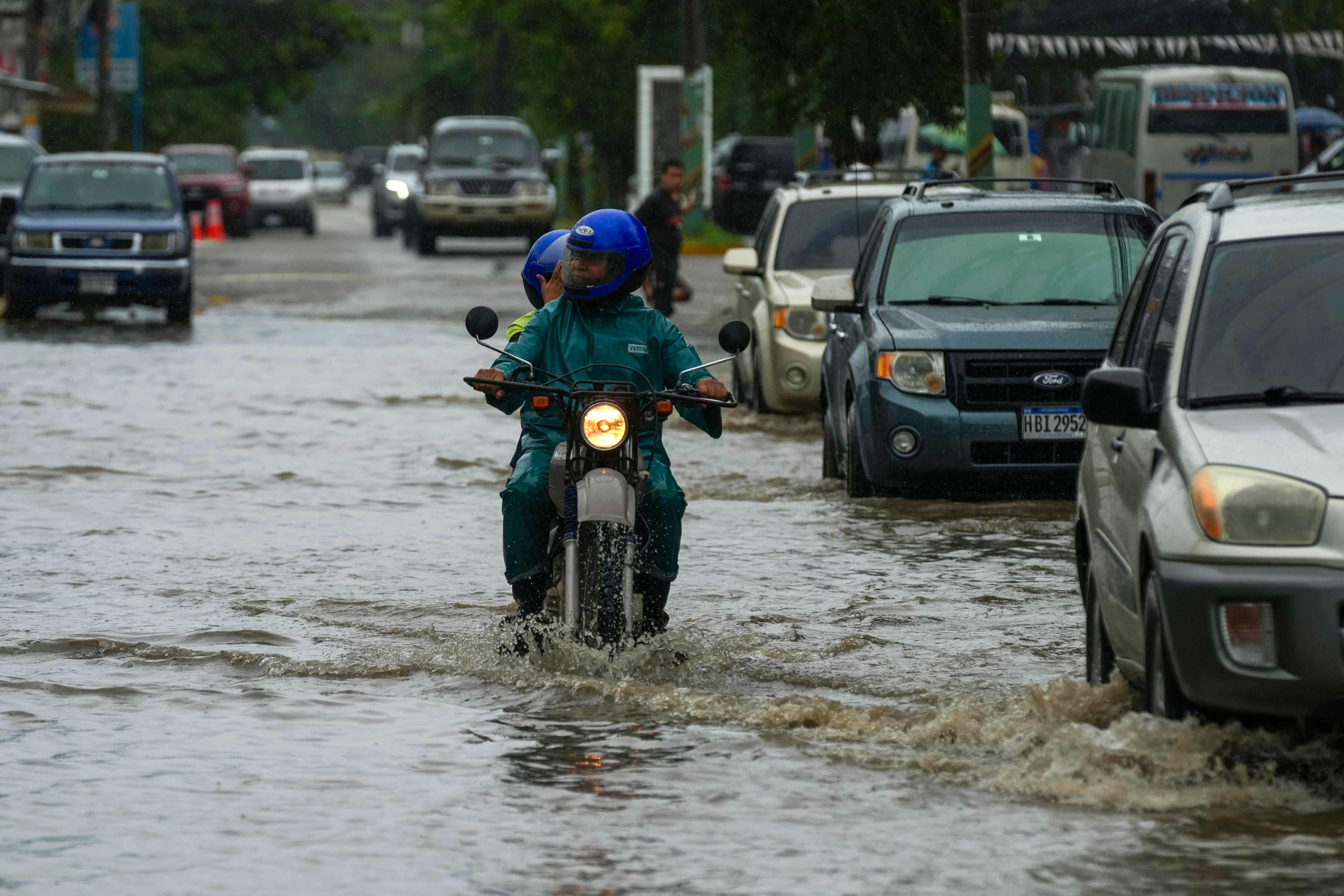 Streets flooded by rains from Tropical Storm Sara in La Lima, Honduras. The storm moved through the Caribbean and doused Honduras with rain on Friday