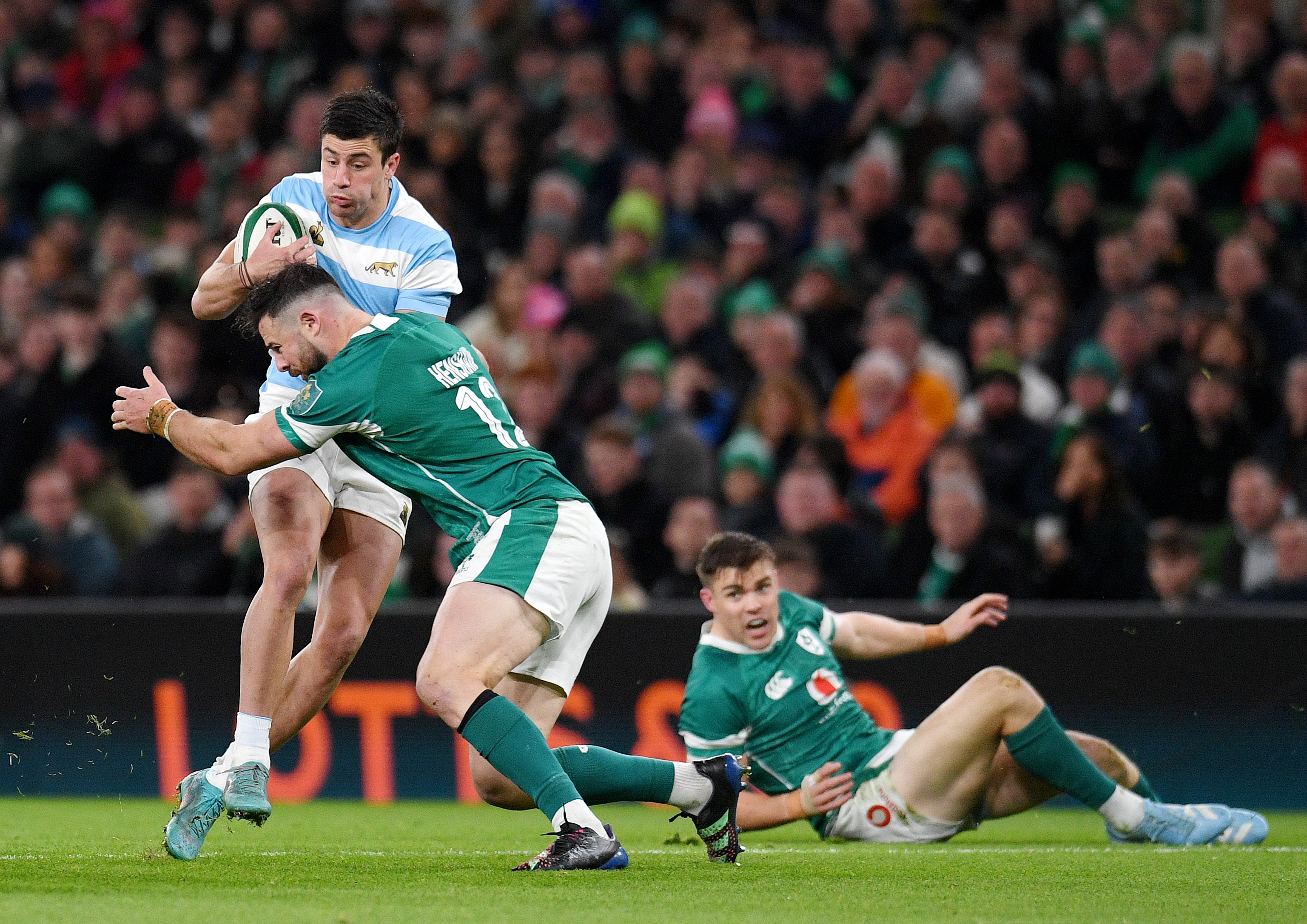 Bautista Delguy of Argentina is challenged by Garry Ringrose