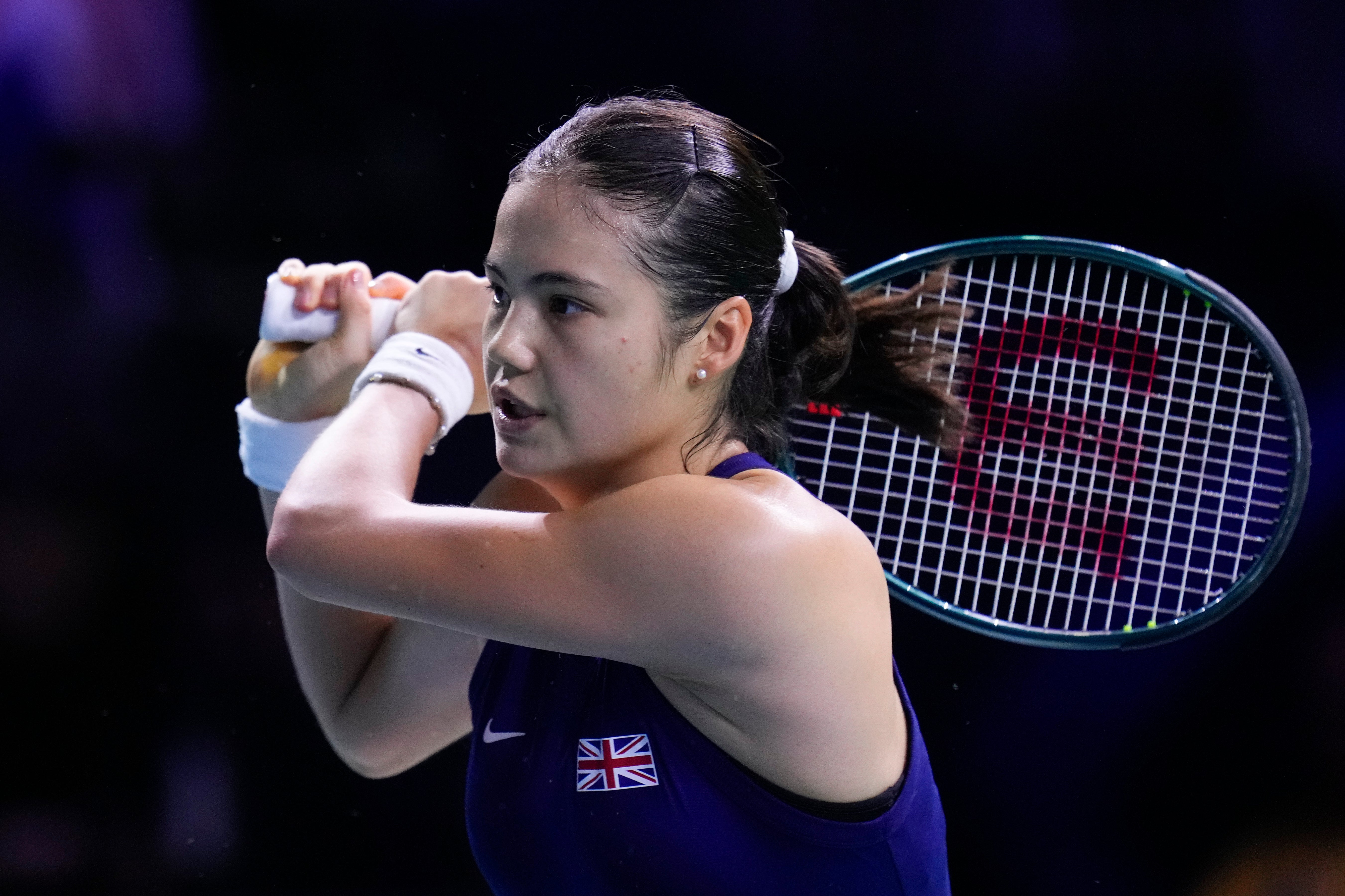 Emma Raducanu strikes a backhand (Manu Fernandez/AP)