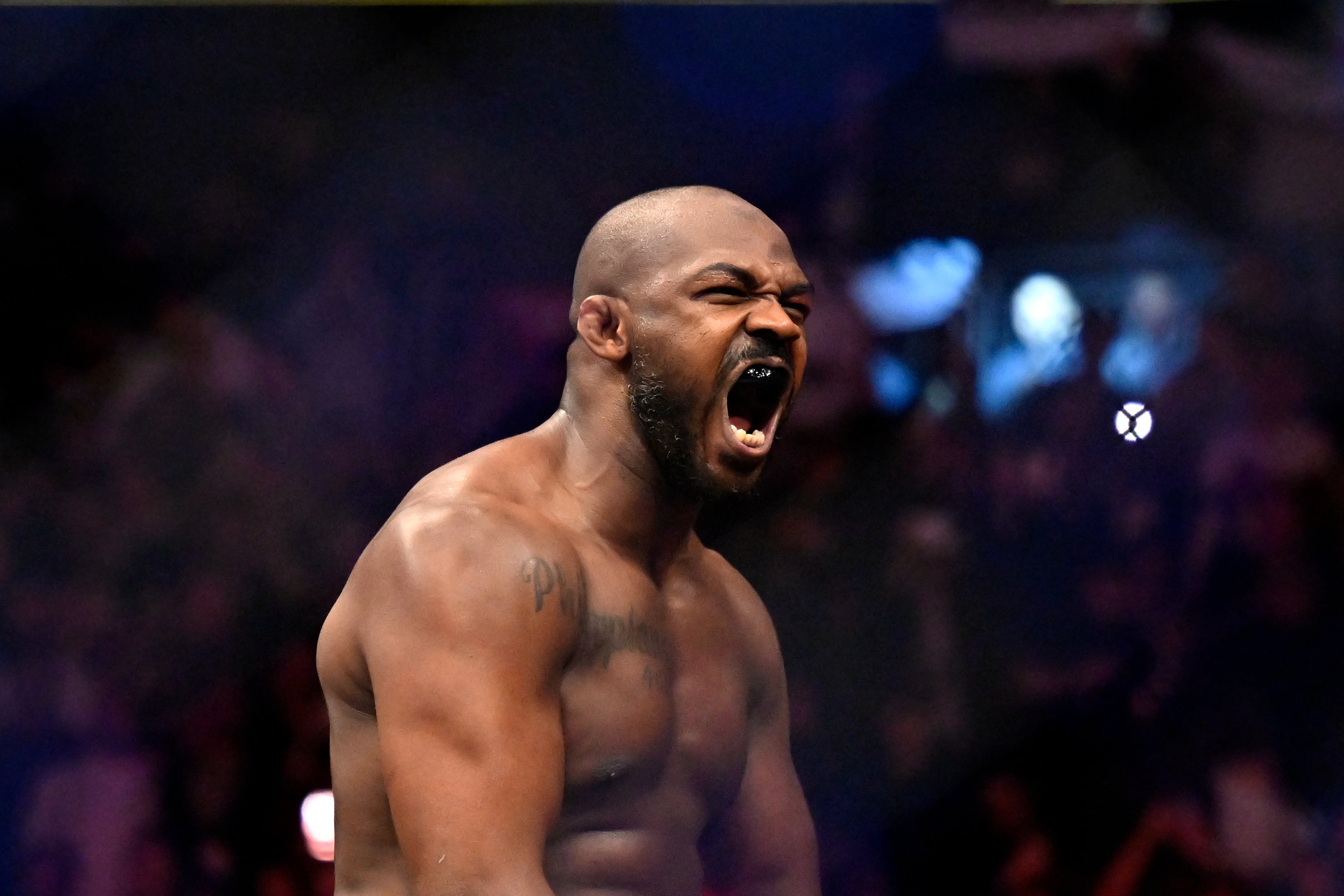 Jon Jones reacts after his victory over Ciryl Gane at UFC 285