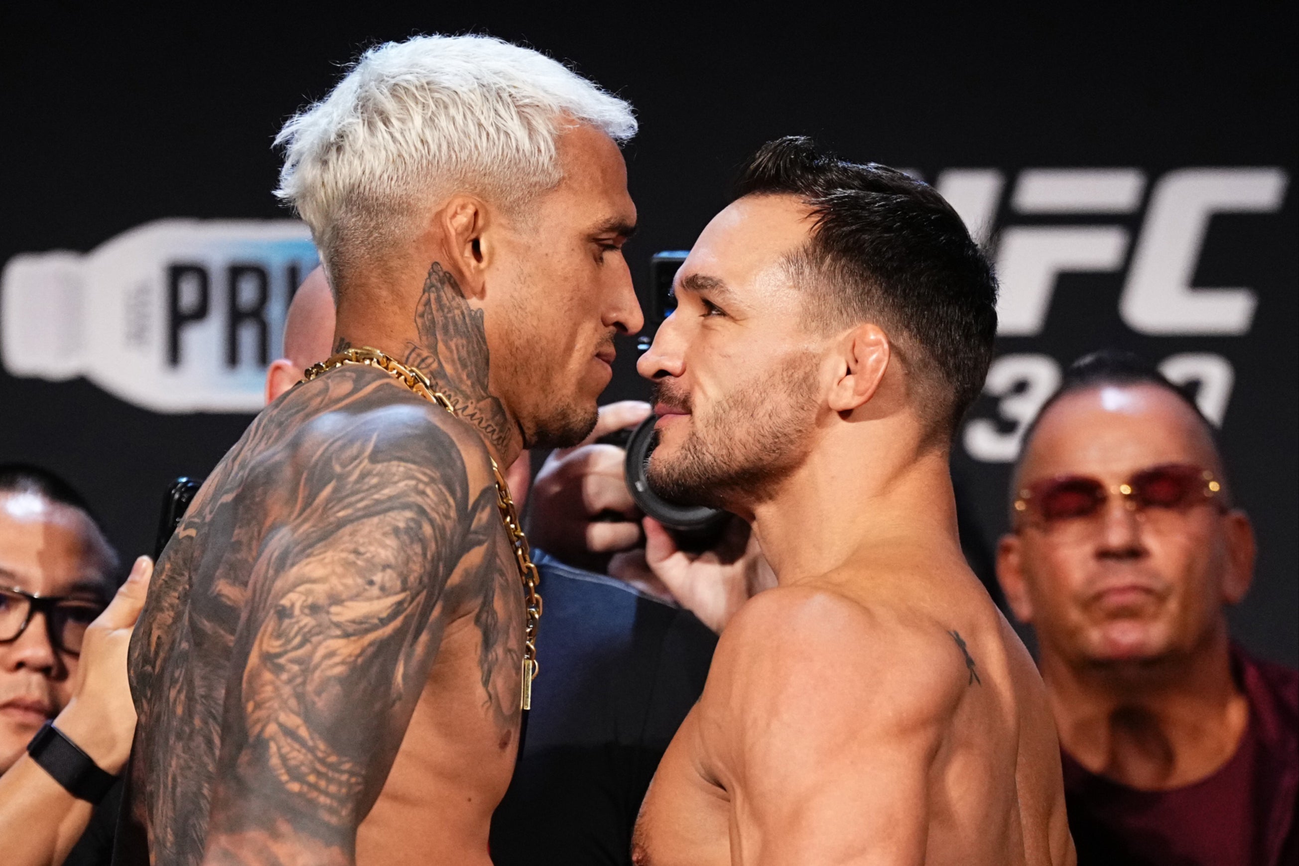 Charles Oliveira (left) and Michael Chandler will meet in a rematch