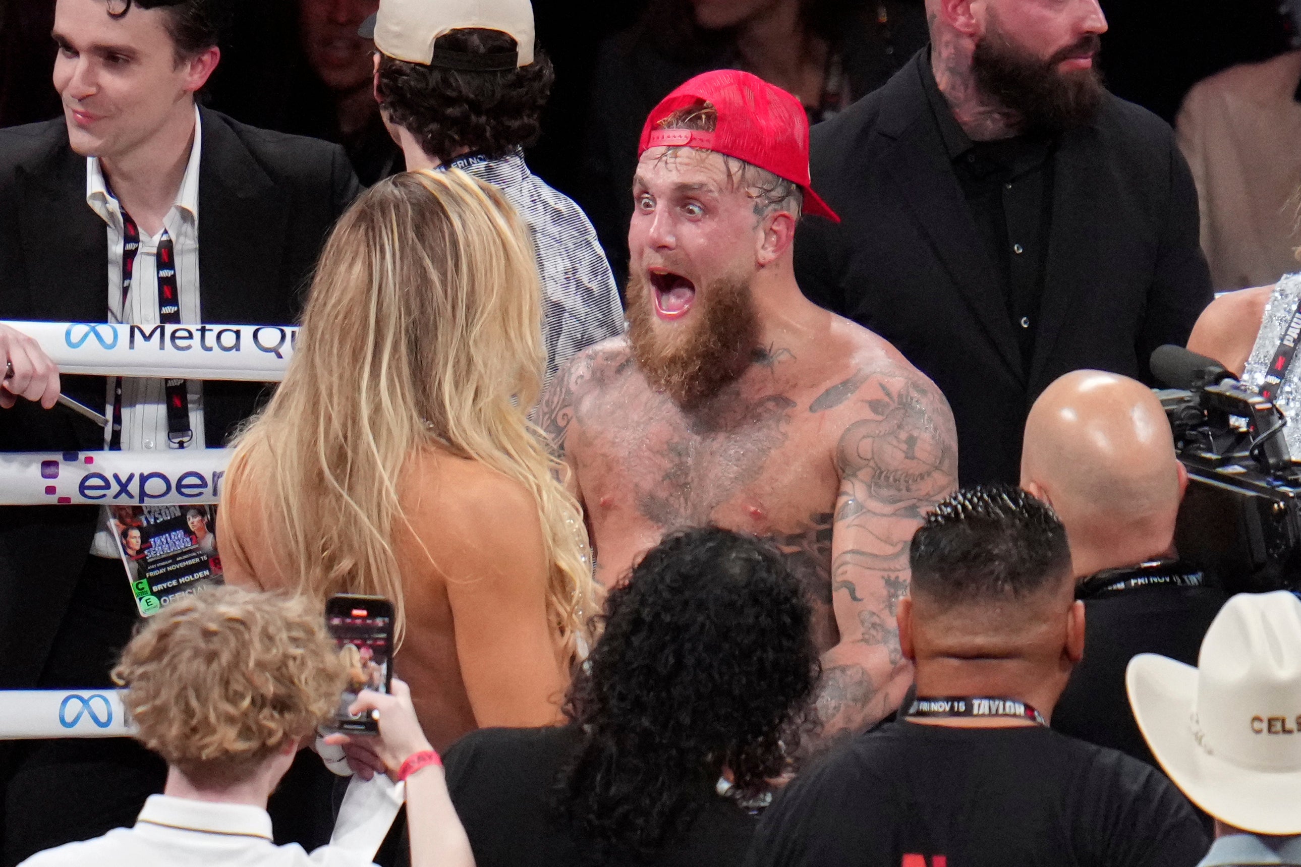 Jake Paul reacts after defeating Mike Tyson in their heavyweight boxing match