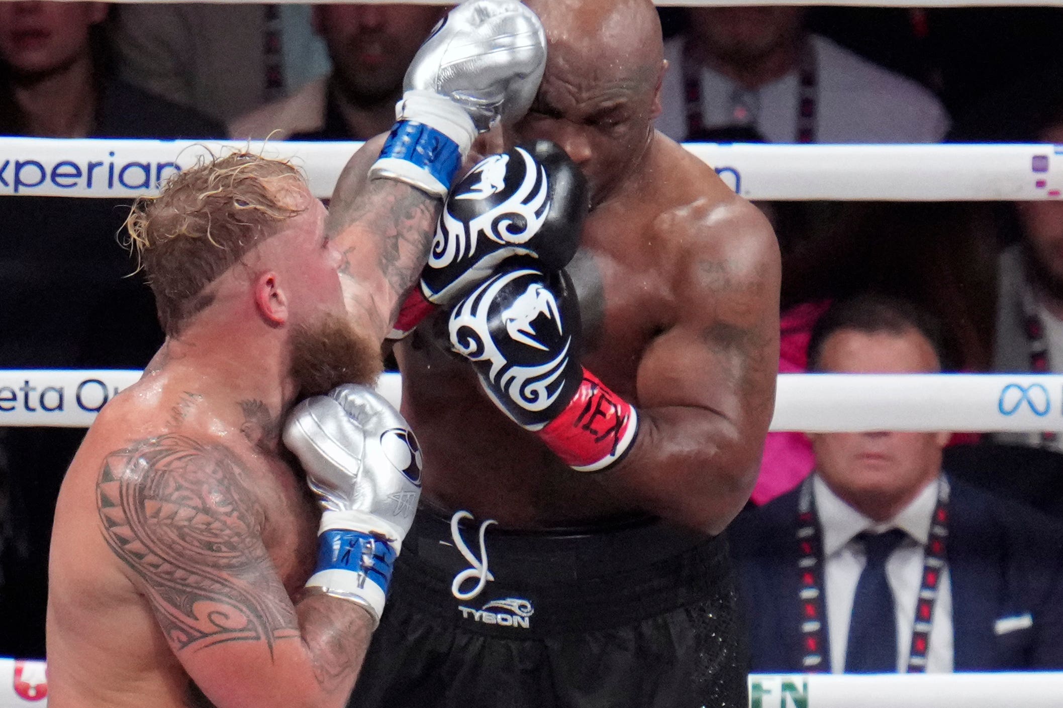 Mike Tyson (right) was defeated by Jake Paul on Friday night (Julio Cortez/AP)