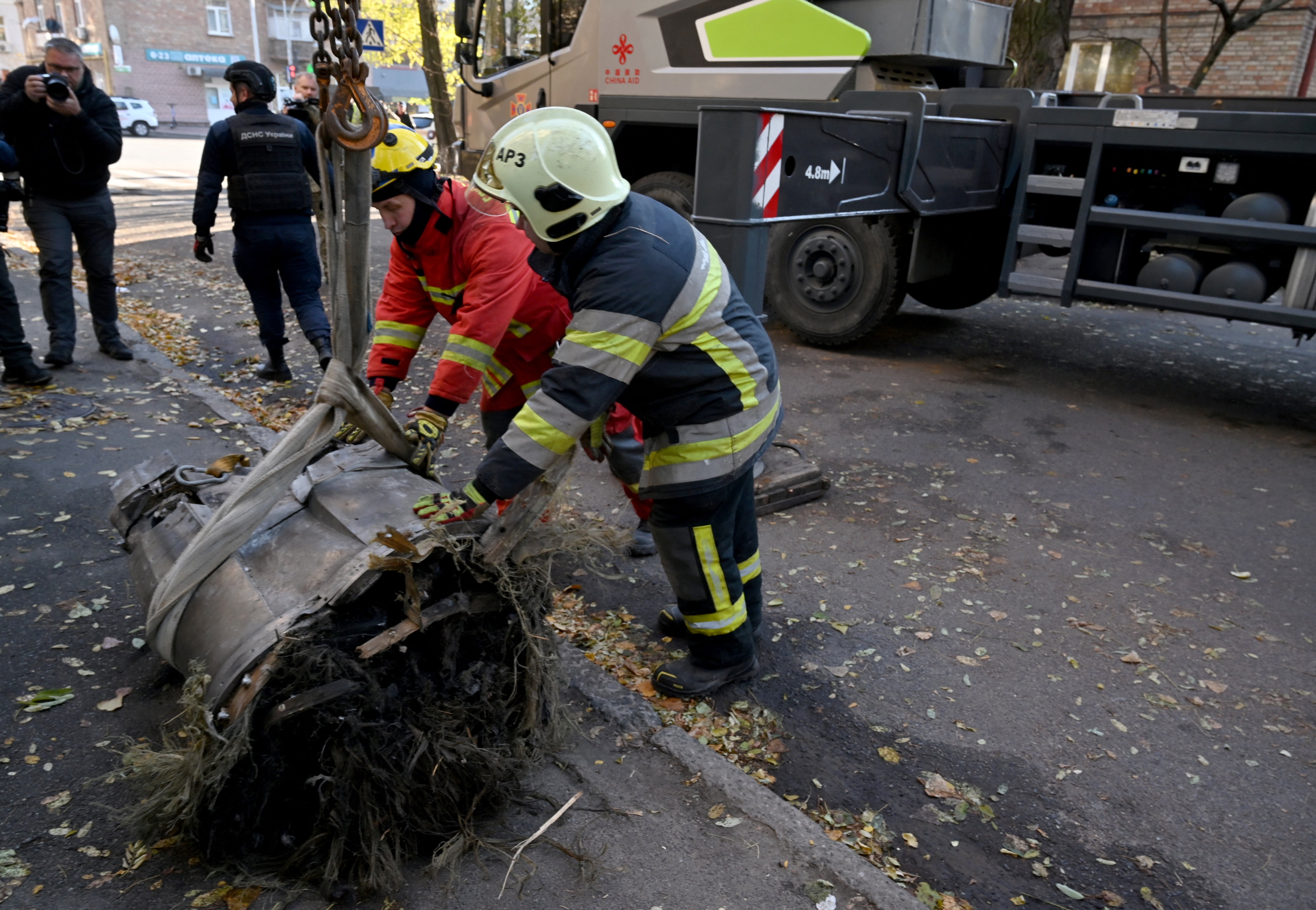 Experts remove fragments of a downed Russian hypersonic Zircon missile that fell on a five-storey residential building in Kyiv in November