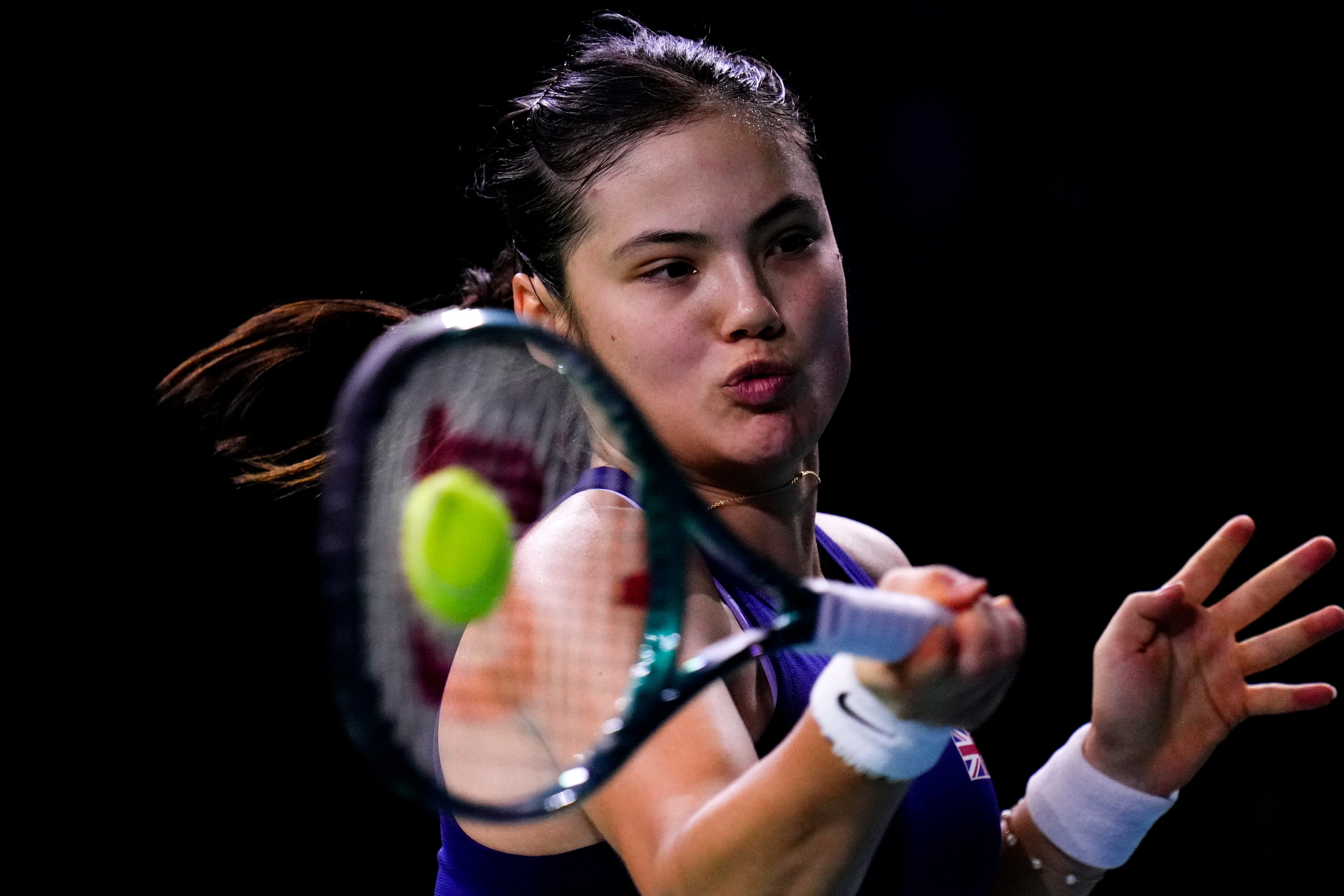 Emma Raducanu strikes a forehand (Manu Fernandez/AP)